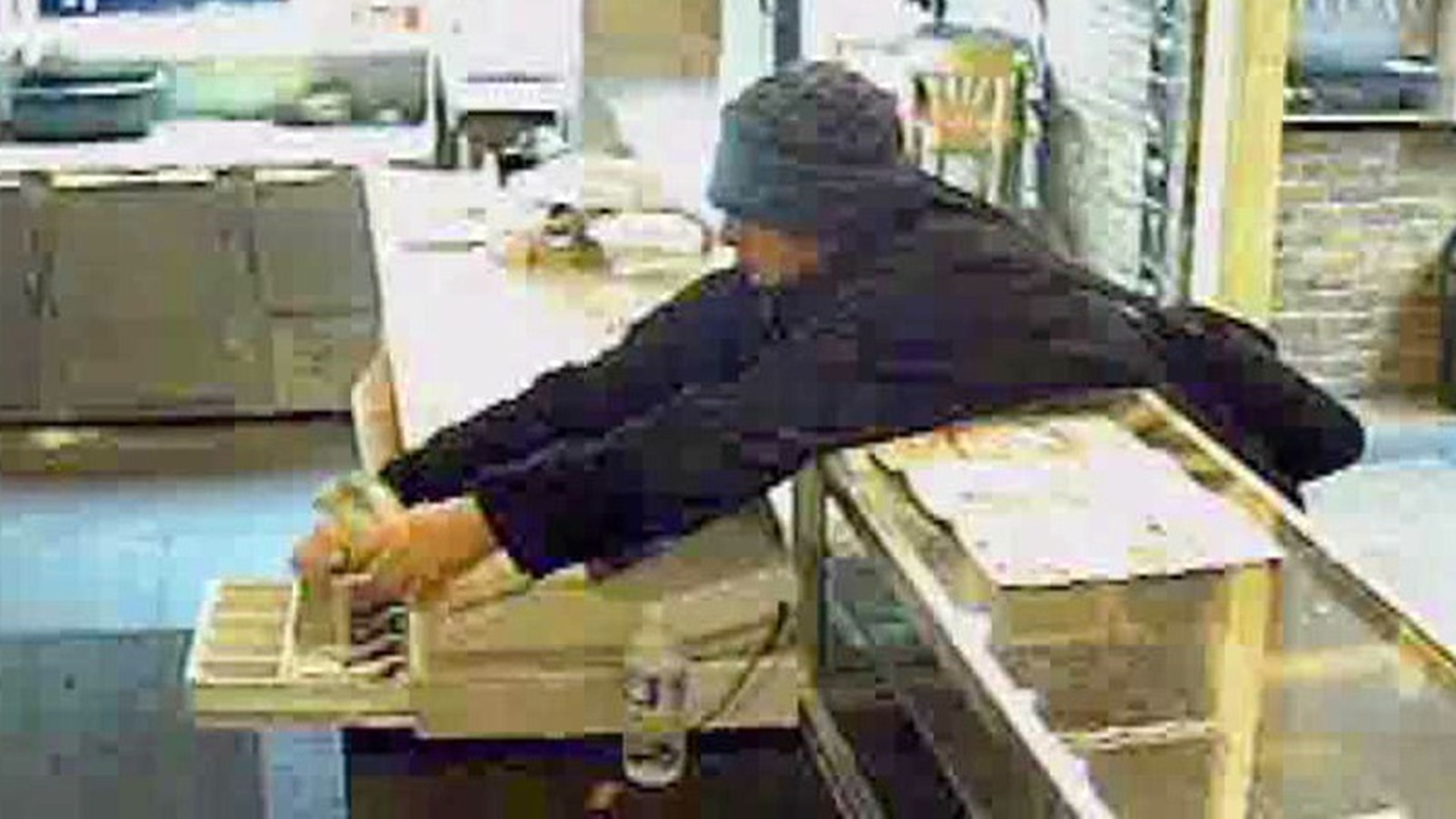 Thief Caught On Camera Stealing From Cash Register