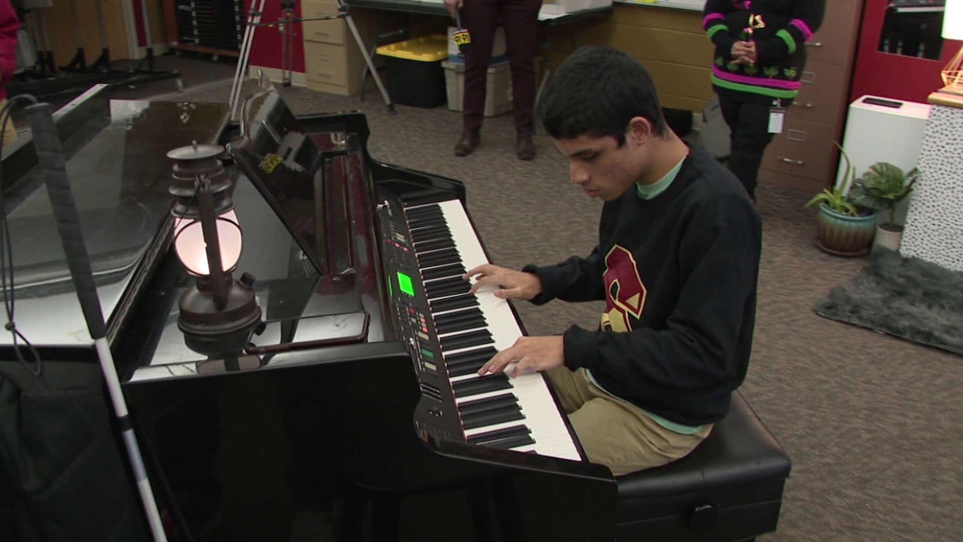 Fabio Zapata Morales shows off his musical talents to connect with others at Scranton High School.