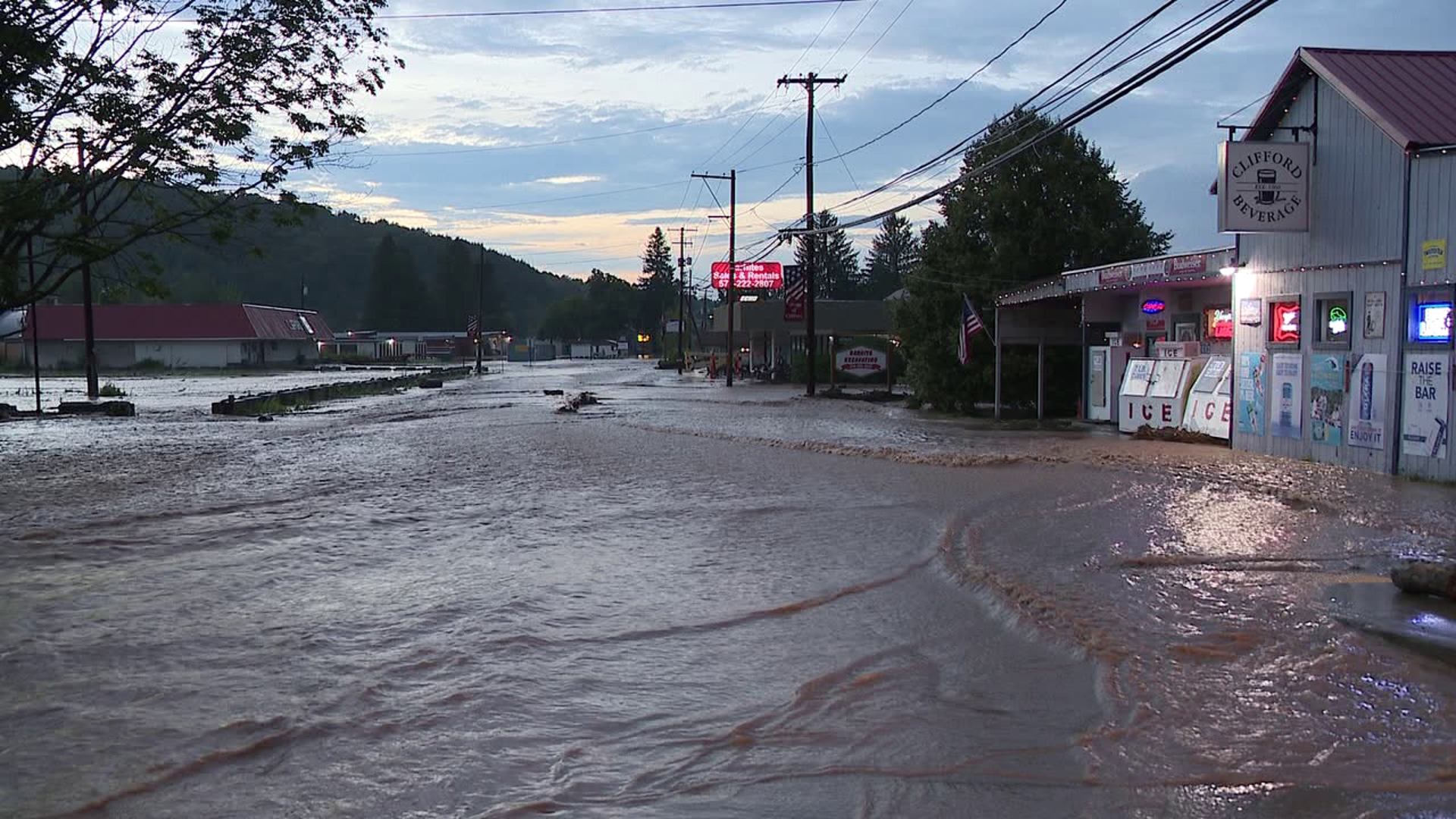 Another round of storms hit this afternoon, forcing closures of roads and some events to end early.