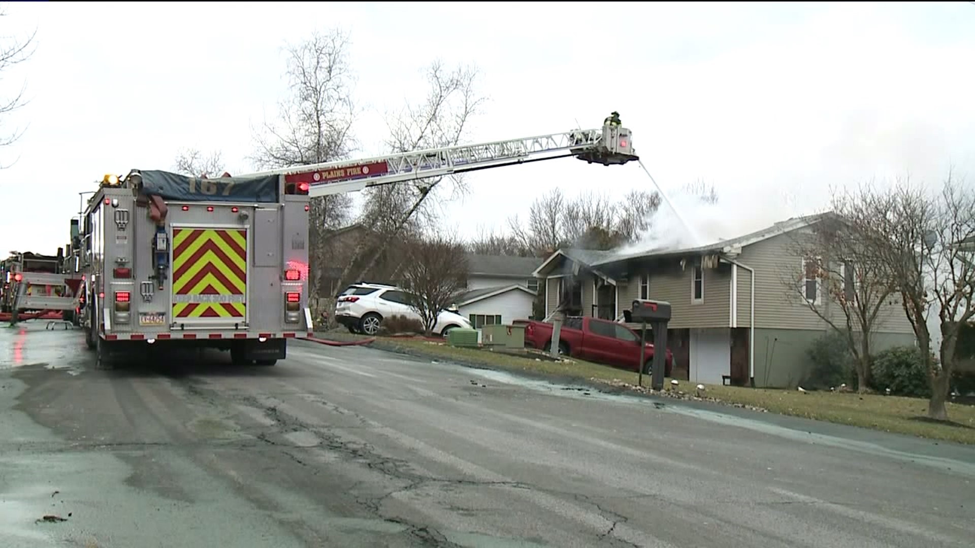 Fire officials say a propane tank exploded, which caused the flames to grow to the front of the home.