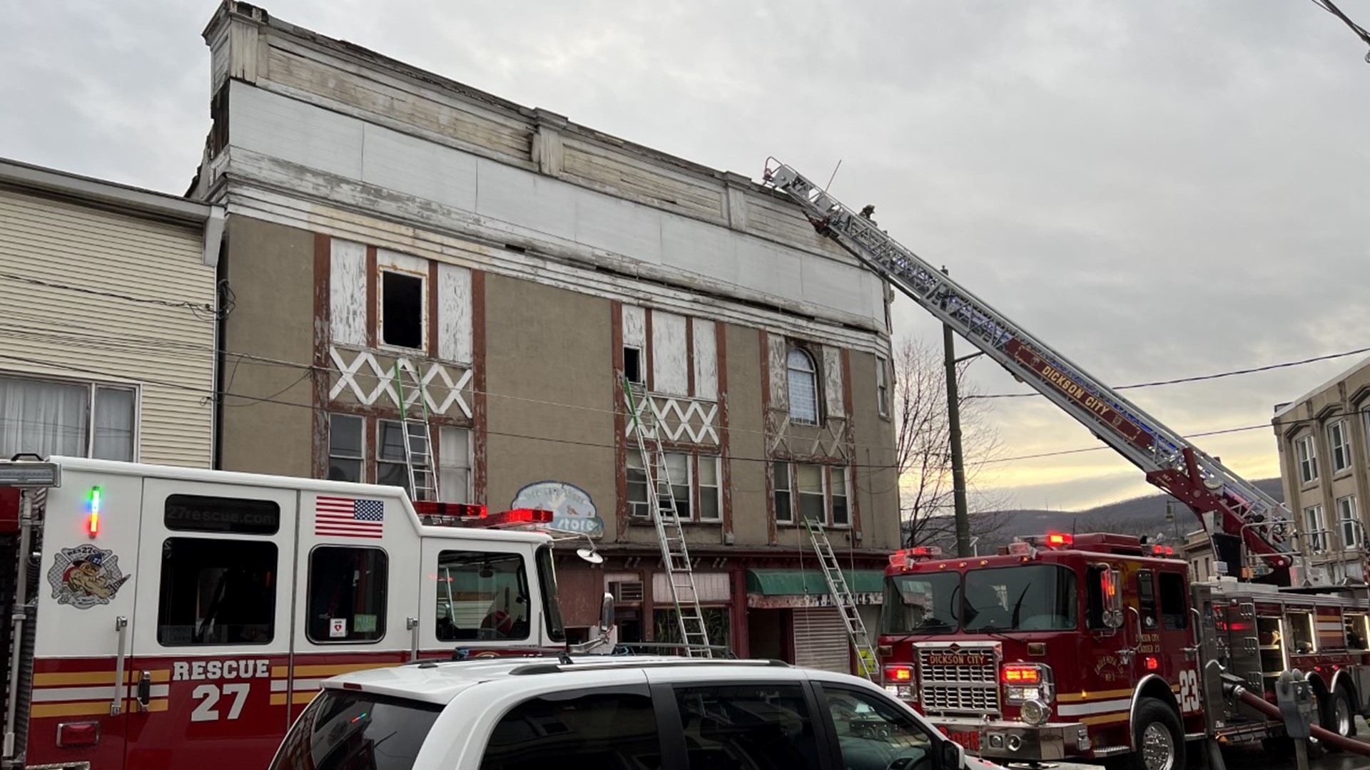 Emergency crews say heavy smoke and flames were coming from the back of the building's first floor.