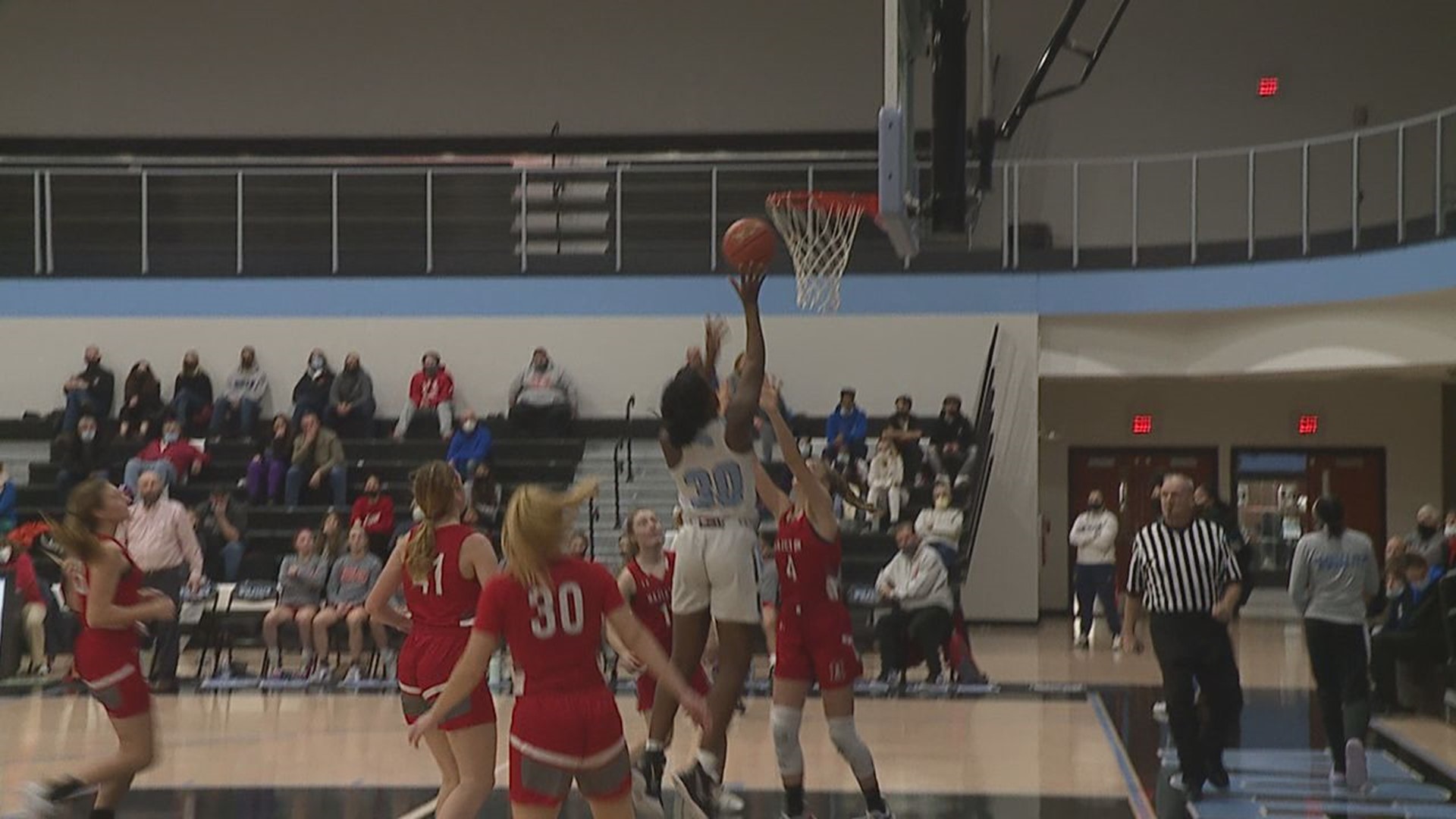 Wolf Pack Hold Off Lady Cougars 49-44 in Battle for First Place