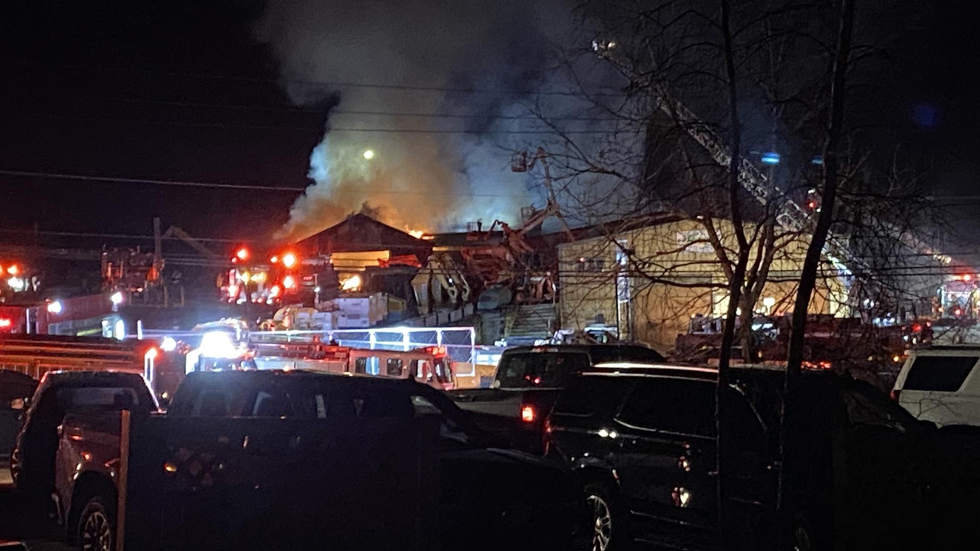 Crews are fighting a fire at a business near Layton Road and Justus Blvd. 