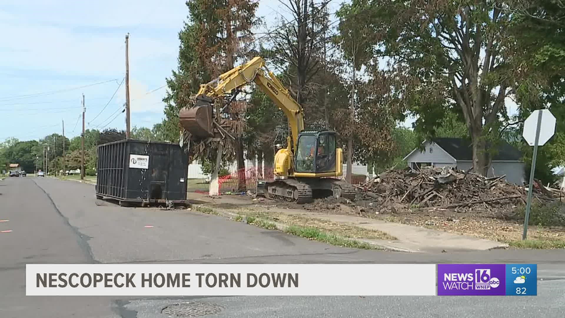 Demolition crews spent the day along First Street in Nescopeck, cleaning away the remaining debris from the fire.