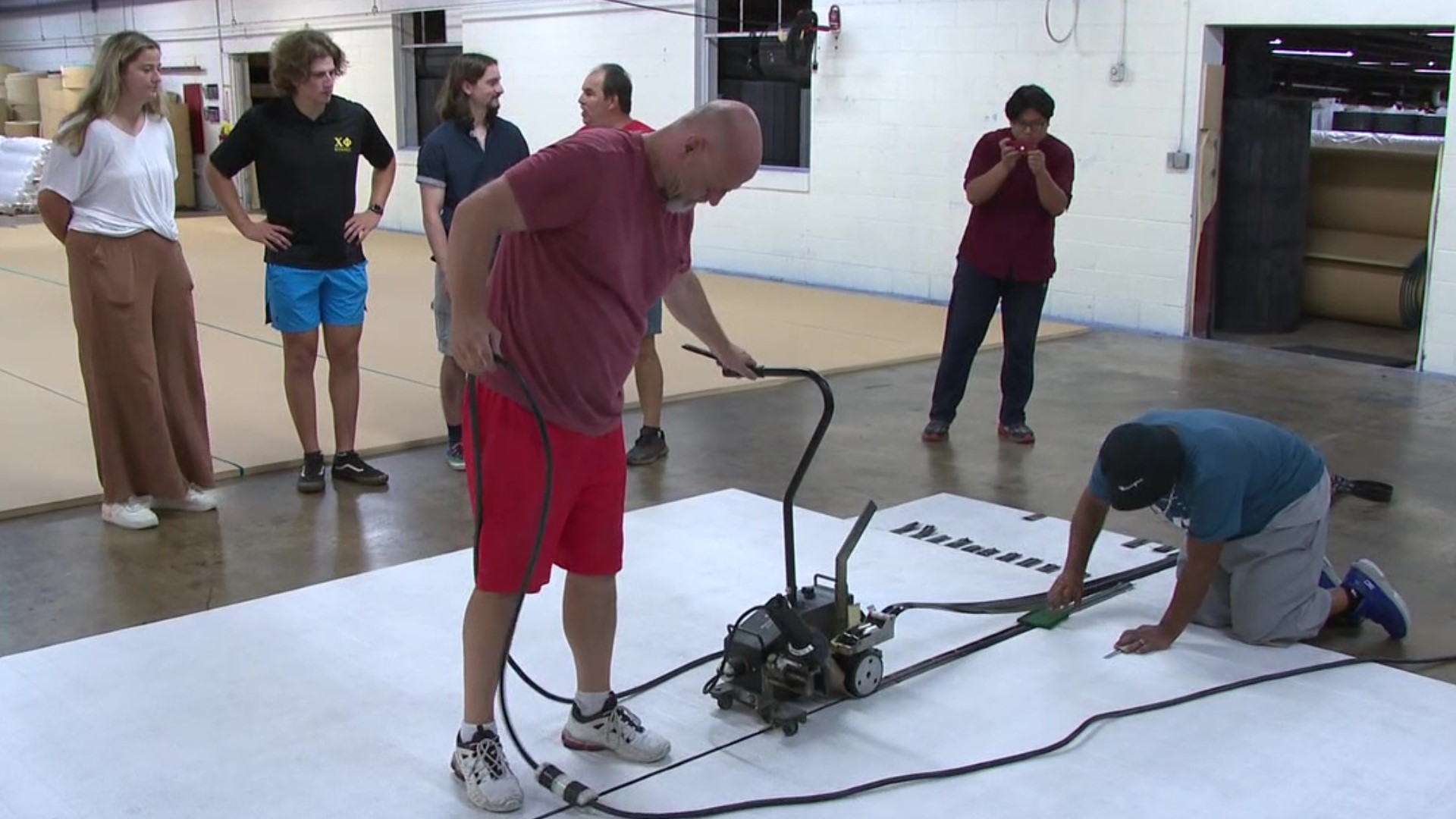 Some Bucknell University engineering students are taking their knowledge outside the classroom and onto the wrestling mats.