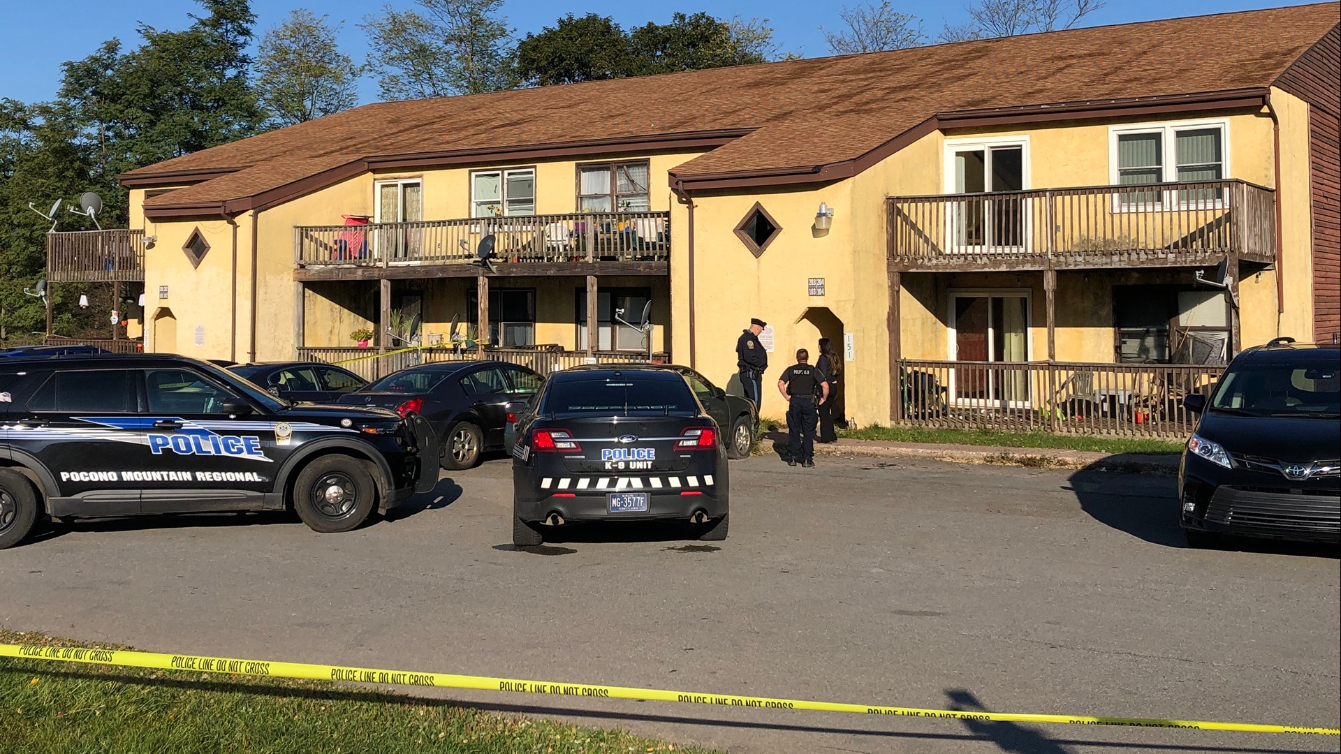 Two people are dead after an early morning shooting in Monroe County and a man with a gunshot wound at the scene has been charged with homicide.