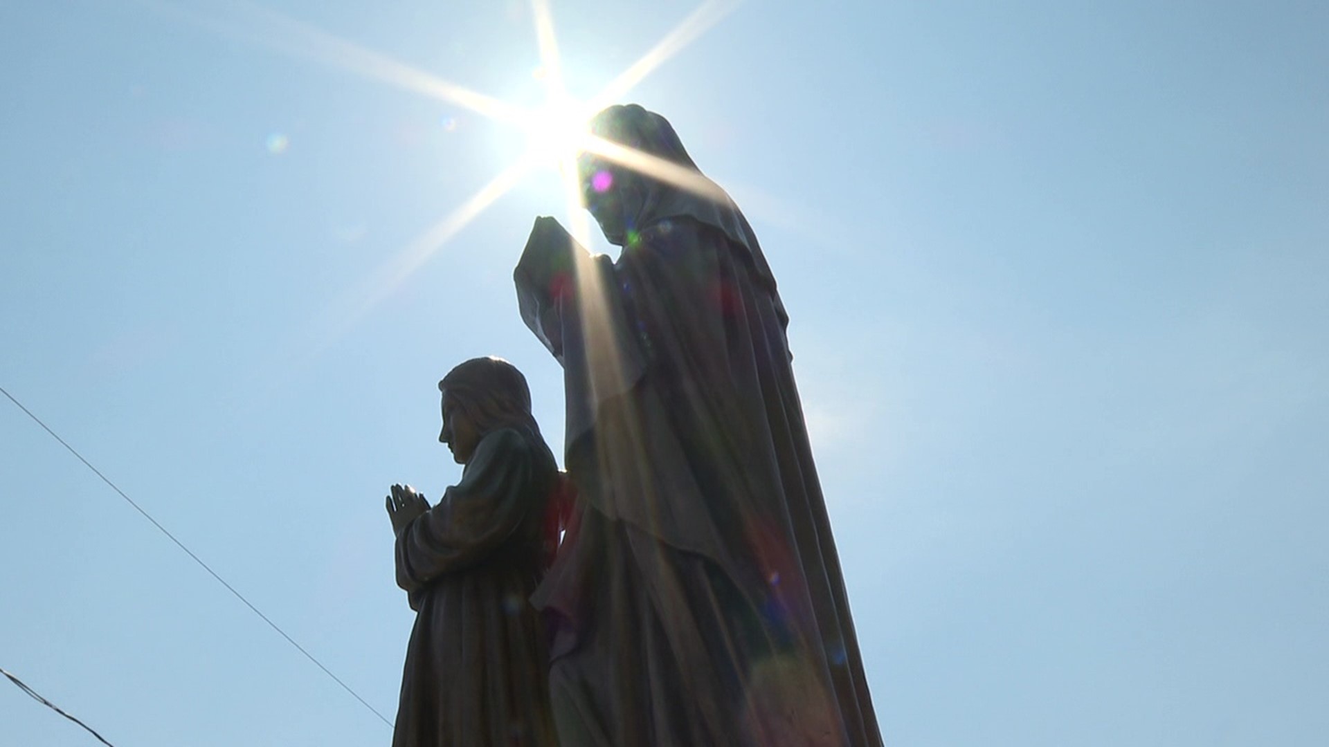 Hot summer weather and the annual novena in Scranton often go together.