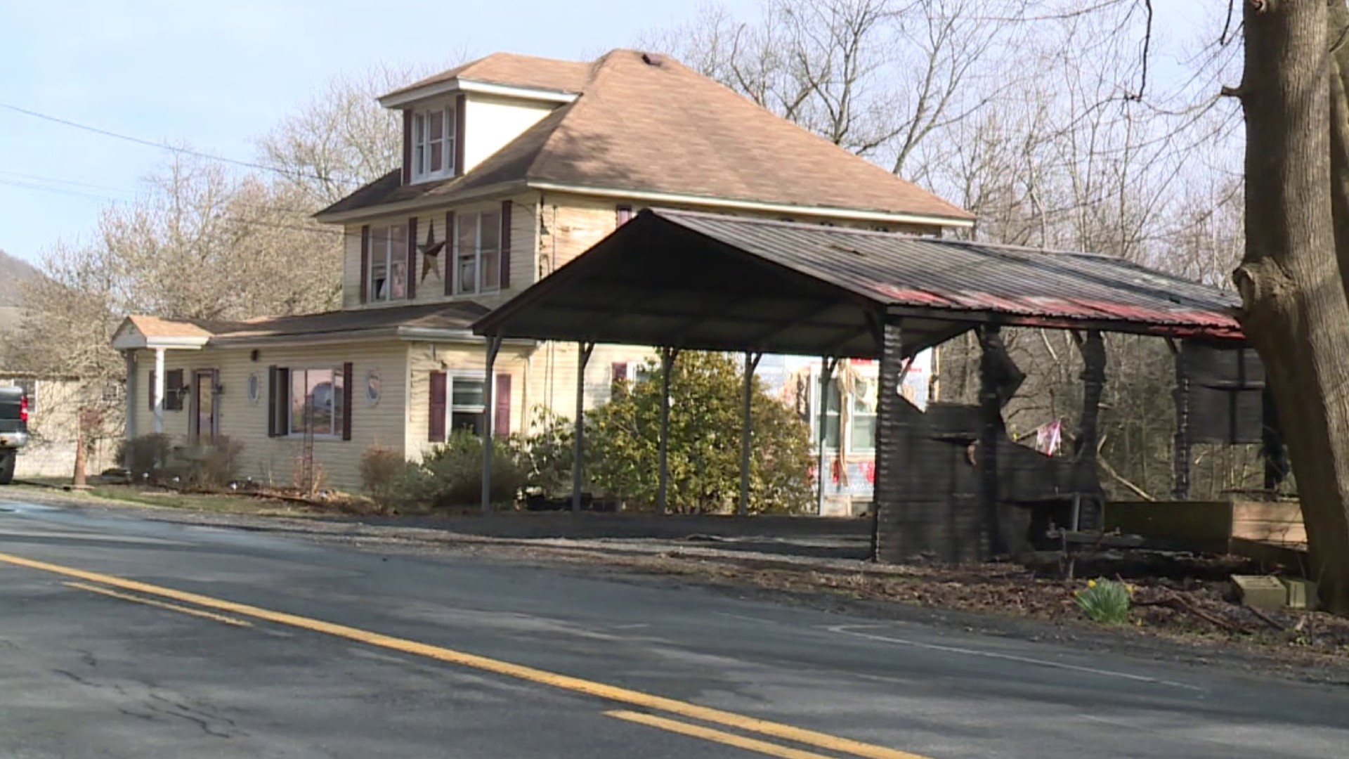 Fire officials say ashes from a burn pit at a home along Upper Road in East Cameron Township spread to a garage around 2:30 p.m. Tuesday.