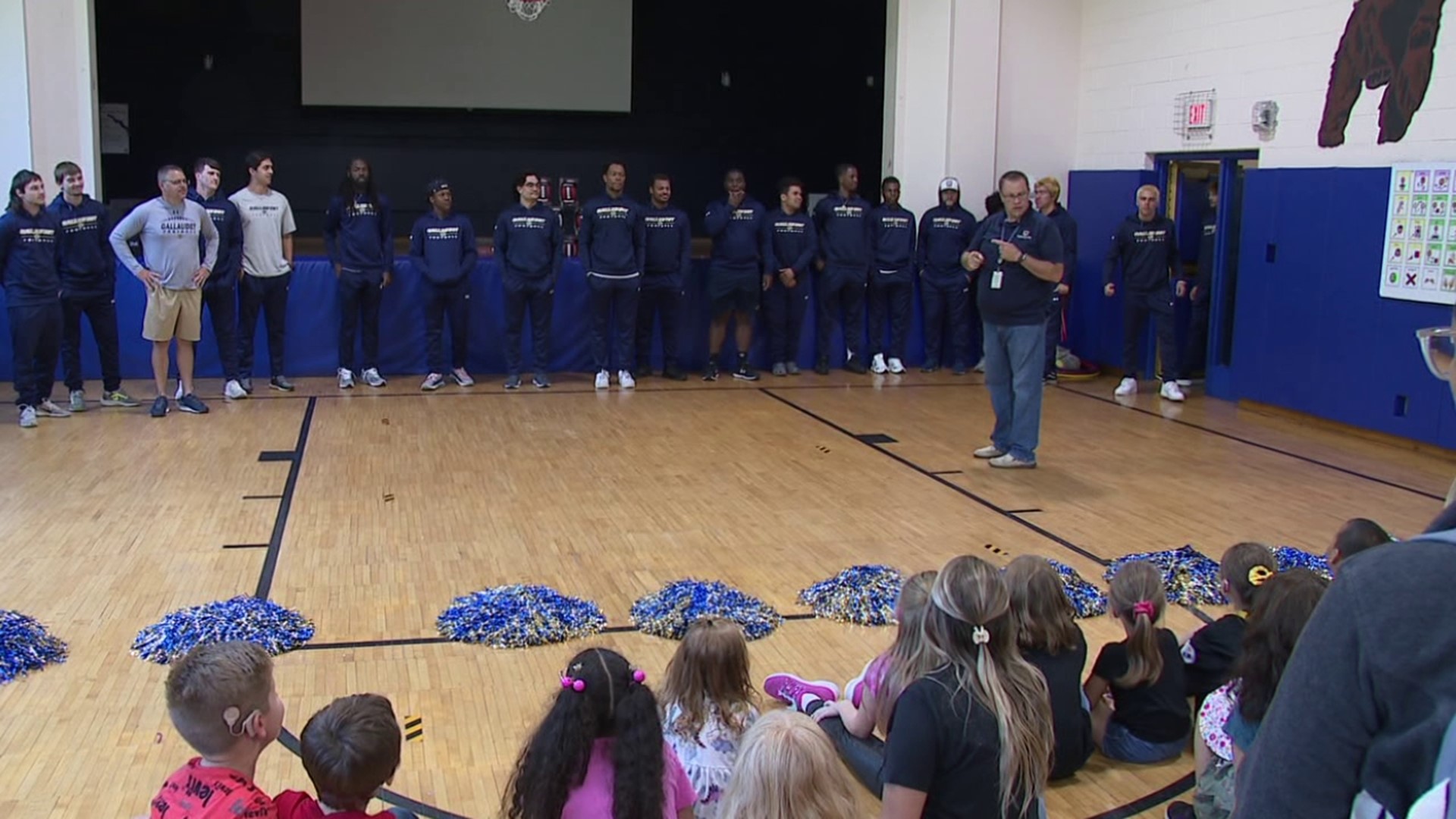 Gallaudet University football team is in town to play Keystone College but made a trip to the school for a pep rally with students who share the same disability.