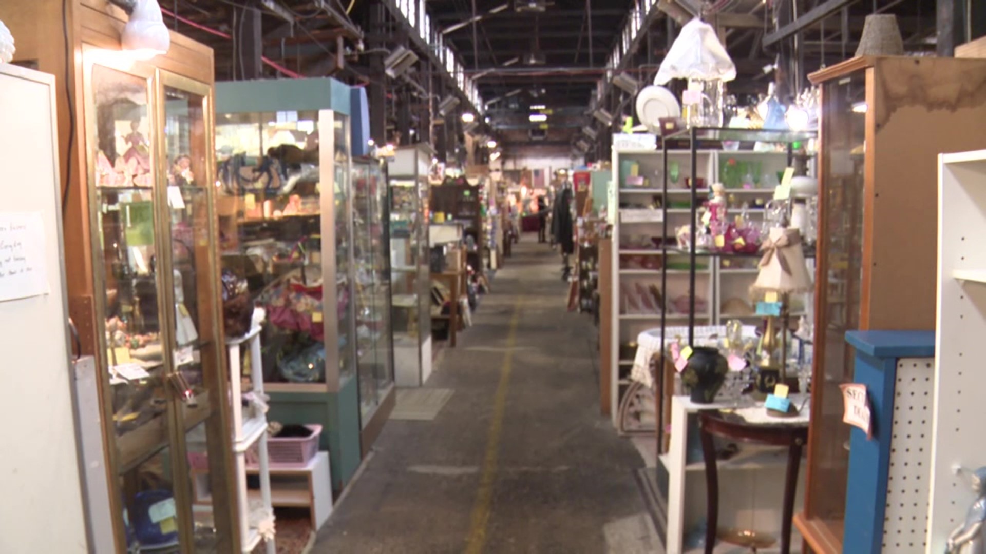 Antique dealers at the Olde Engine Works say people are buying more practical gifts and spending less.