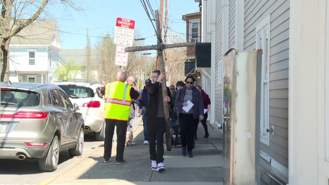 Worshippers walk the stations of the cross in the Poconos. - Vimarsana News