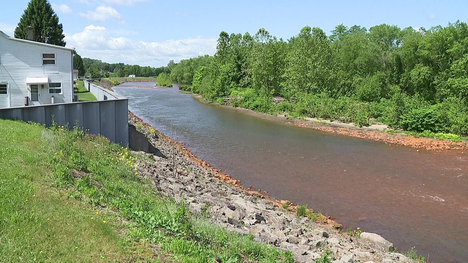 Luzerne County officials are working out details of the project meant to protect the borough from the Lackawanna and Susquehanna Rivers.