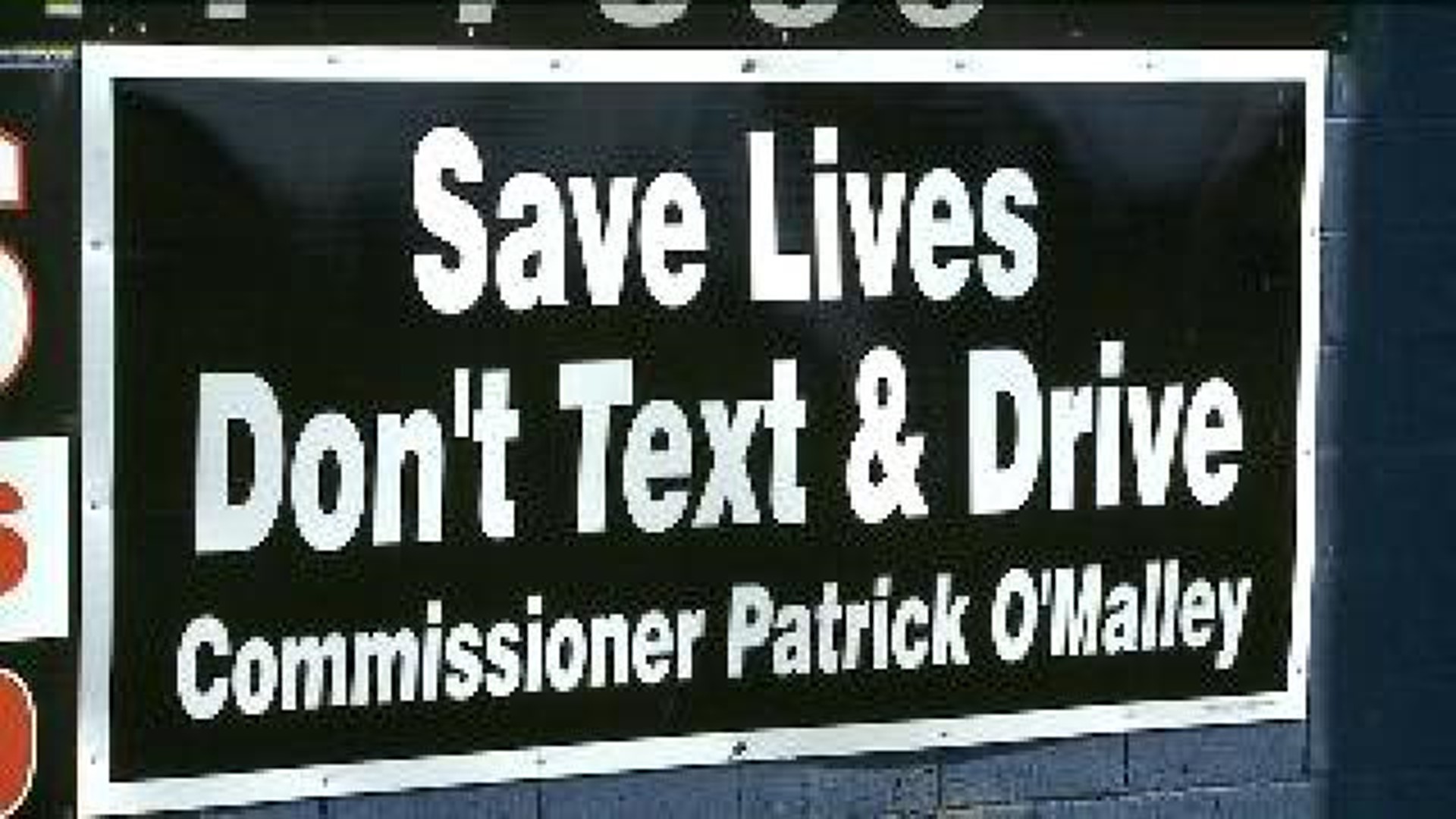 Commissioner Pays for \"Don\'t Text and Drive\" Sign