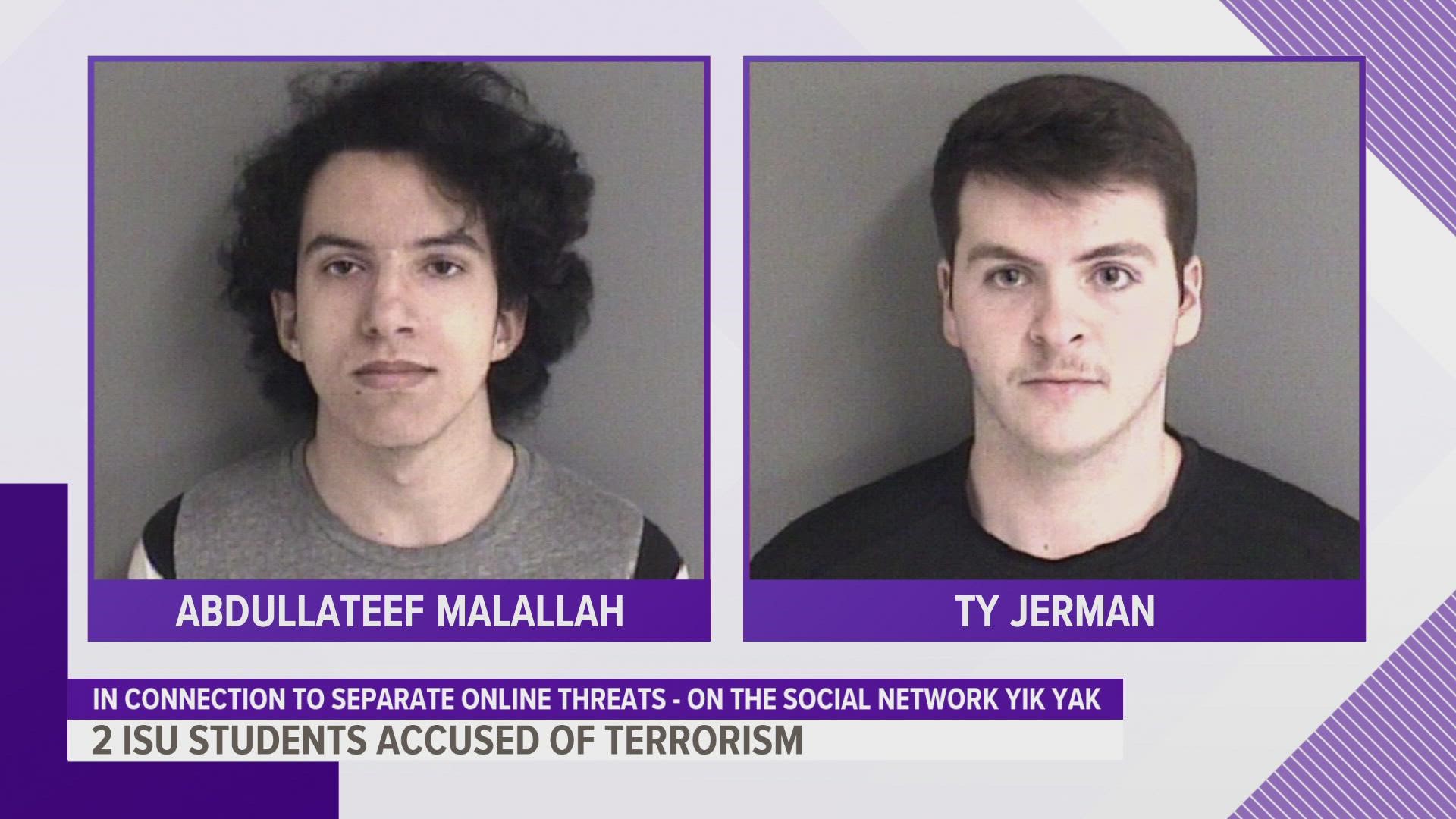 The two freshmen are facing charges in response to posts warning students to avoid certain campus buildings.