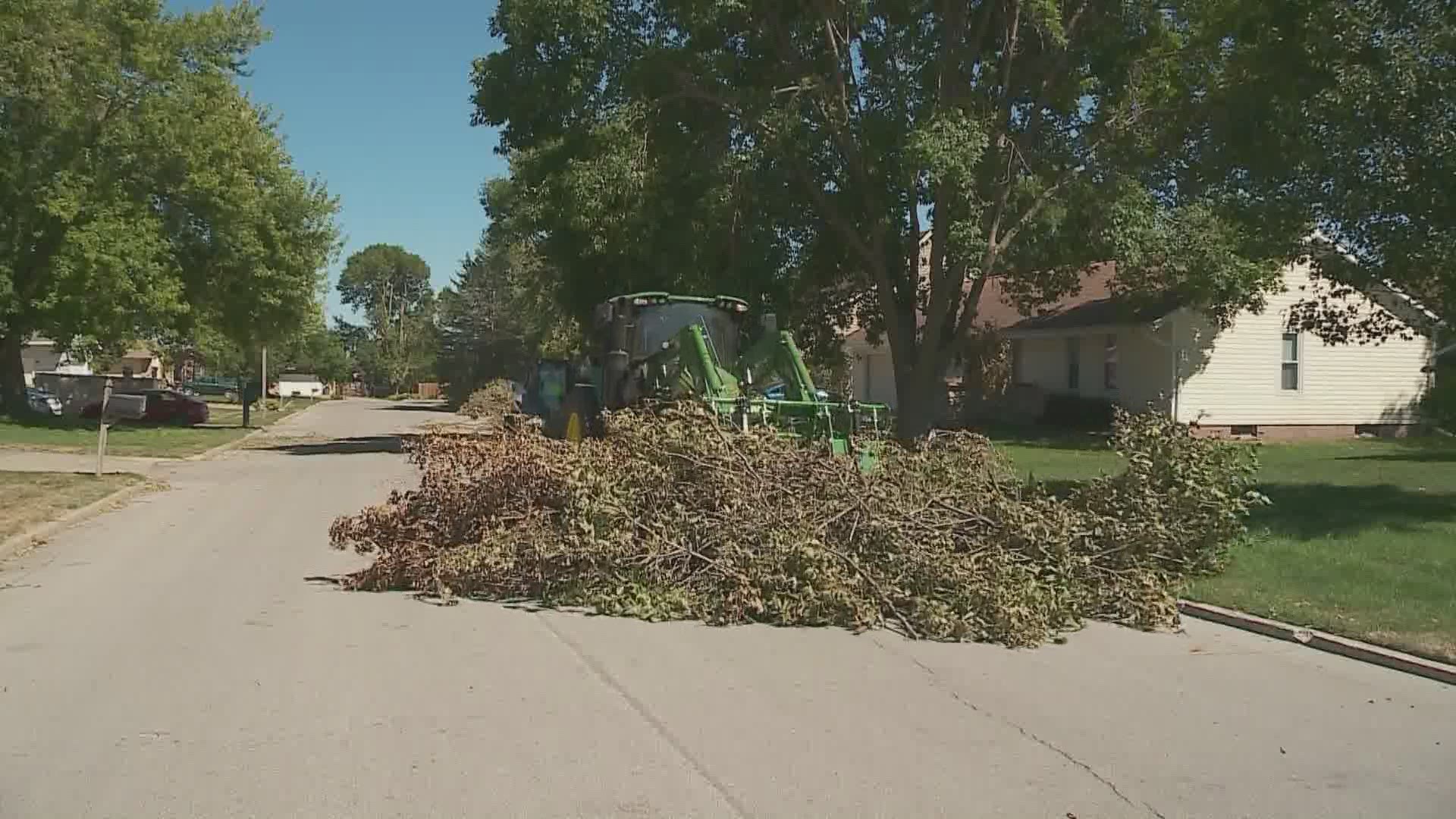 Perry residents continue derecho clean up over a week later