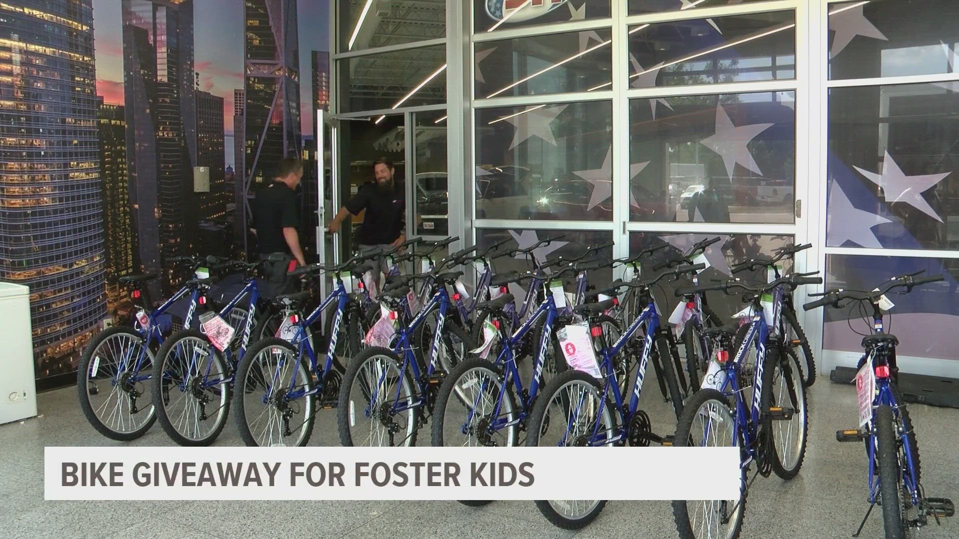 Employees at Ken Garff Stew Hansen Auto Group built 175 bicycles this week to give away to foster kids.