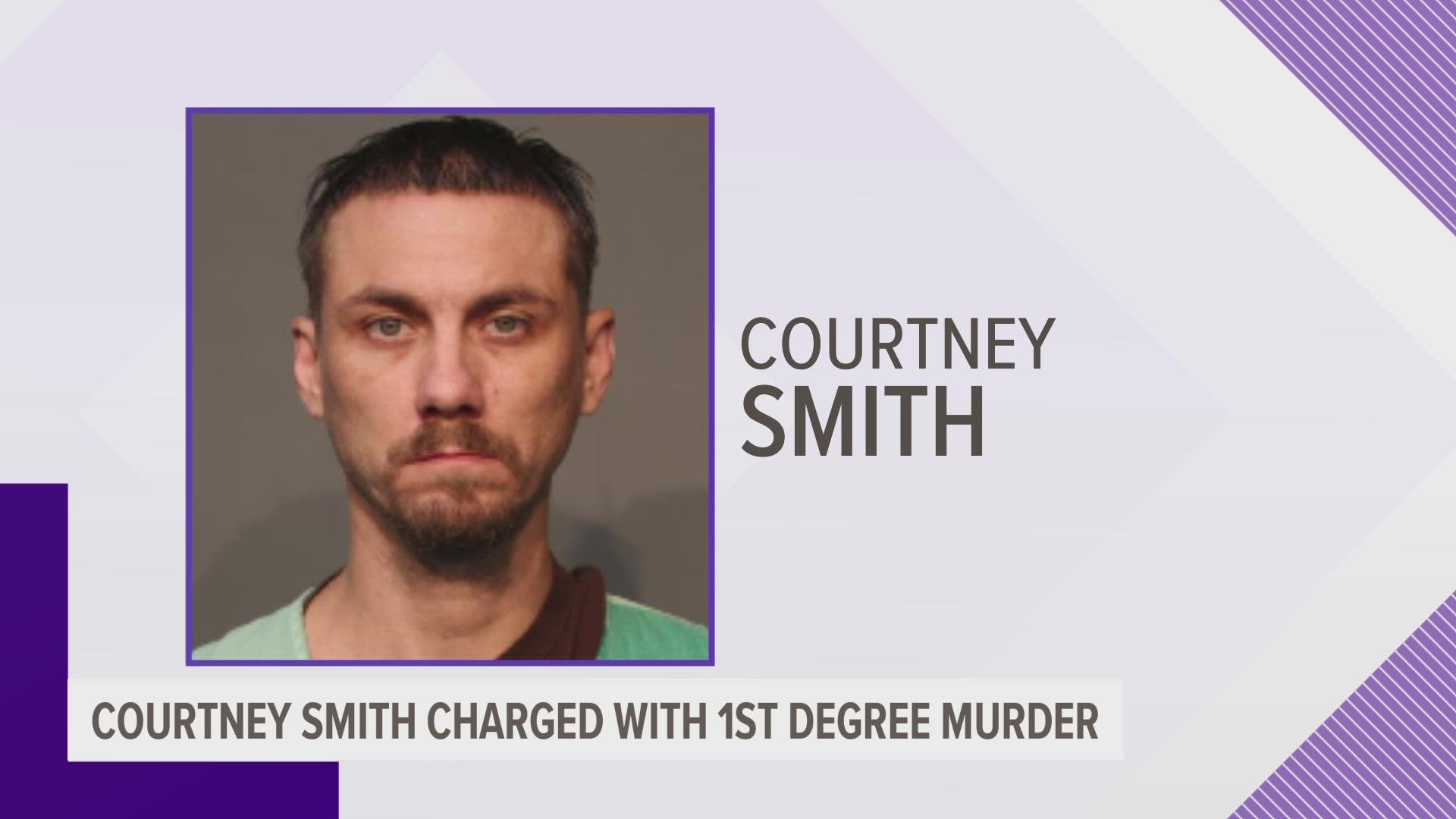 Courtney Smith, 38, is charged with killing 51-year-old Scott Crane of Des Moines.