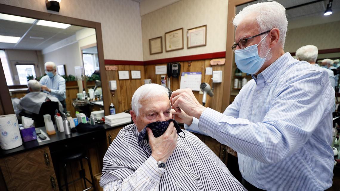 Des Moines barber shop reopens with proper health precautions