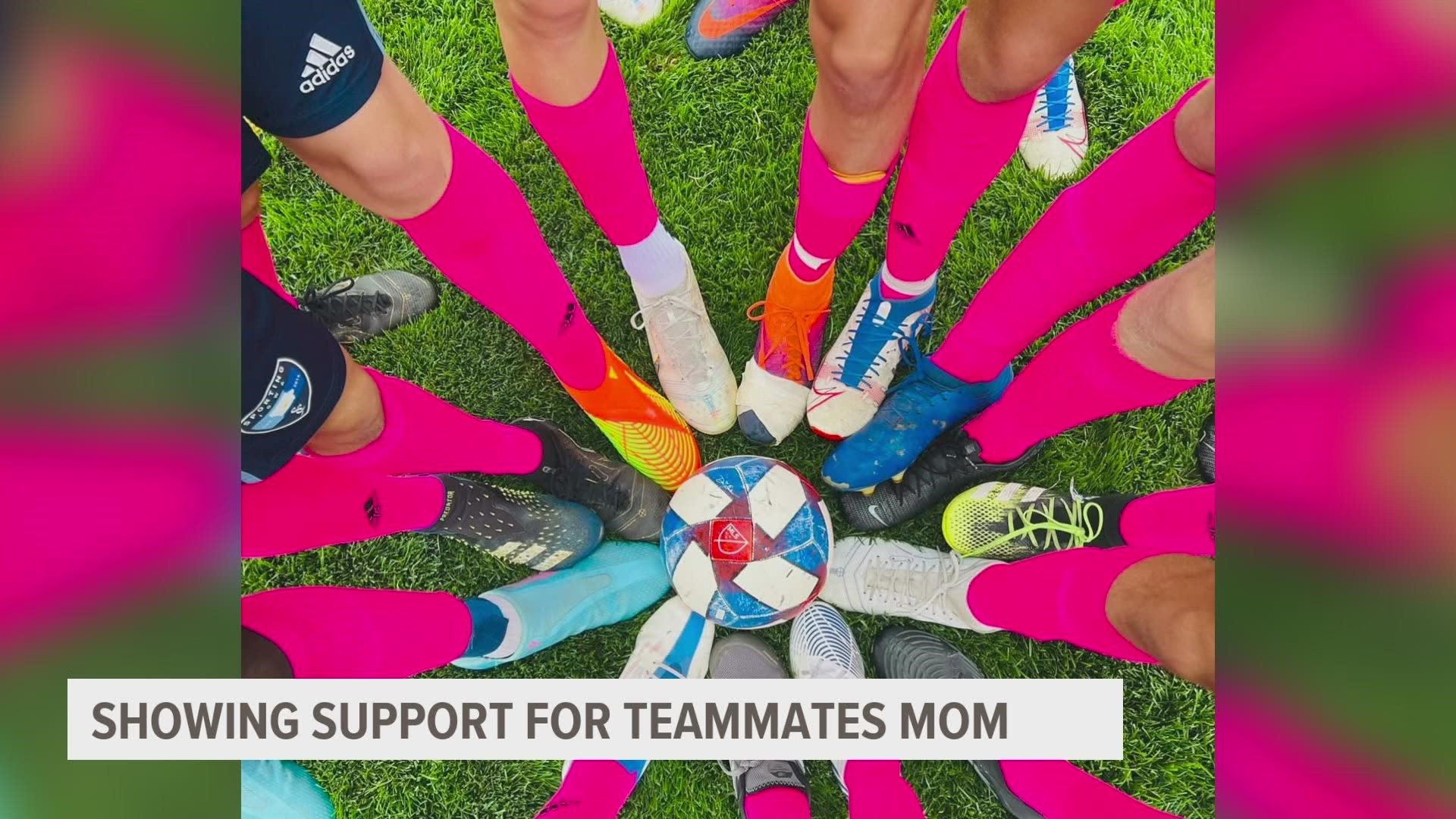 A Sporting Iowa Soccer Club team showing support for a teammate's mom