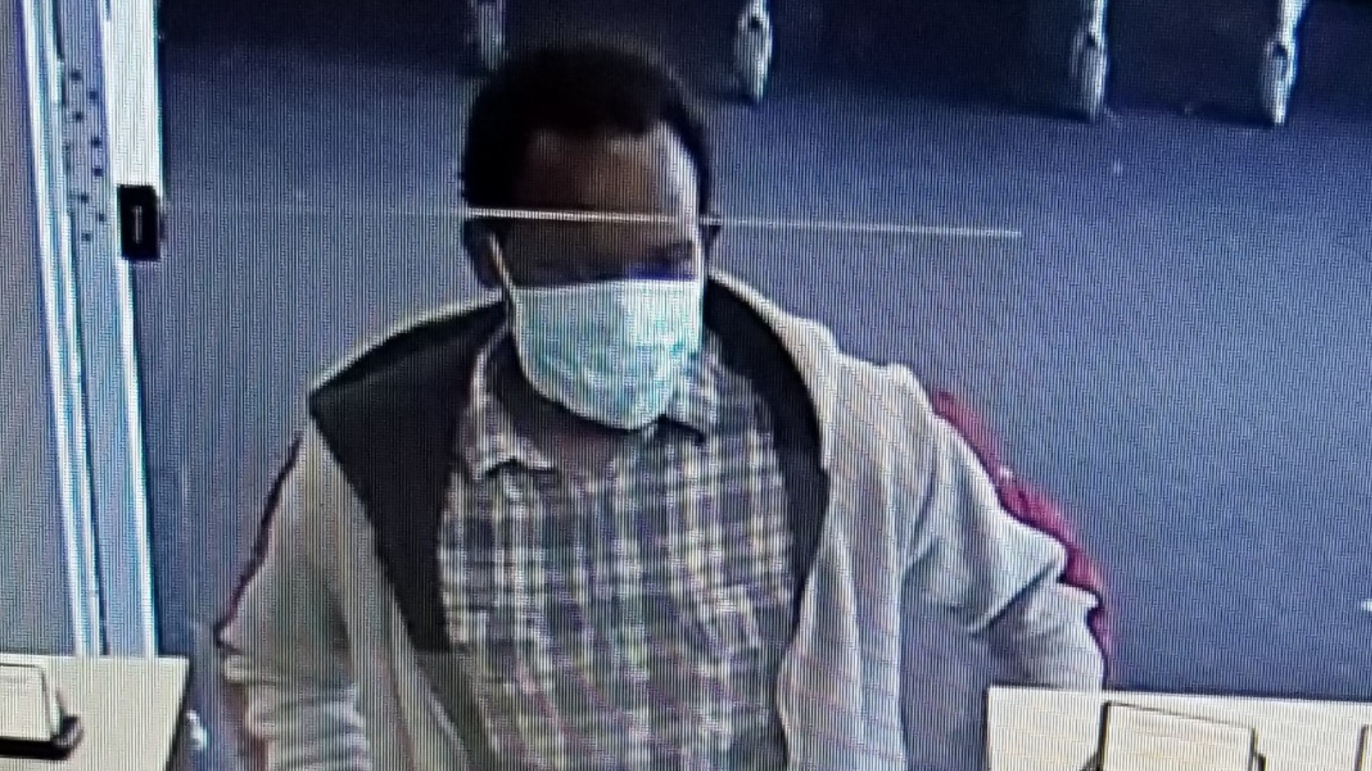 Surveillance footage from the Midwest Family Heritage Bank identifies the suspect as a Black man between 30 to 40 years old.