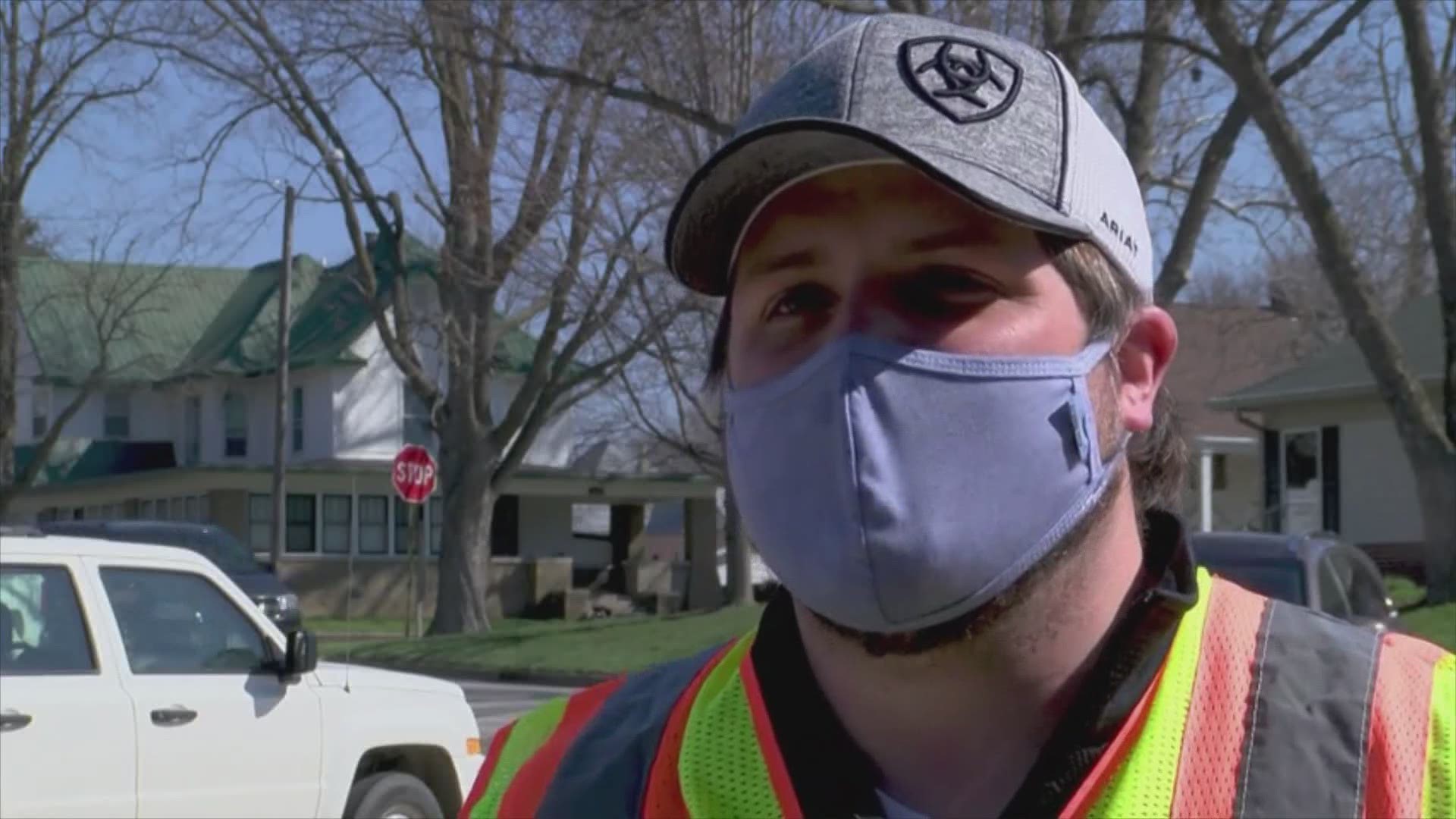 A small committee came together to buy and distribute 6,000 masks at the Fareway parking lot in Perry on Sunday.