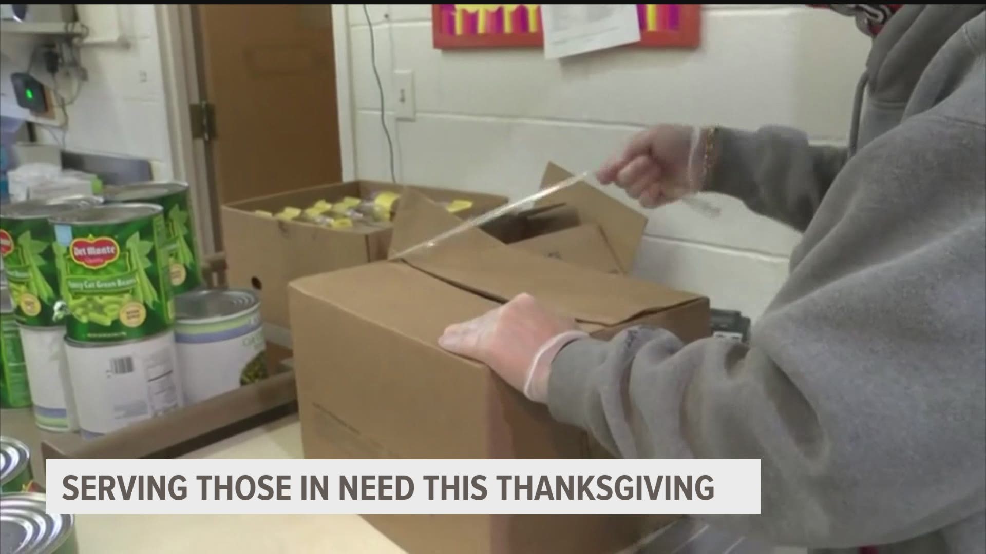 In keeping with their annual tradition, Hope Ministries' volunteers packaged and delivered Thanksgiving meals for the homeless across Des Moines.