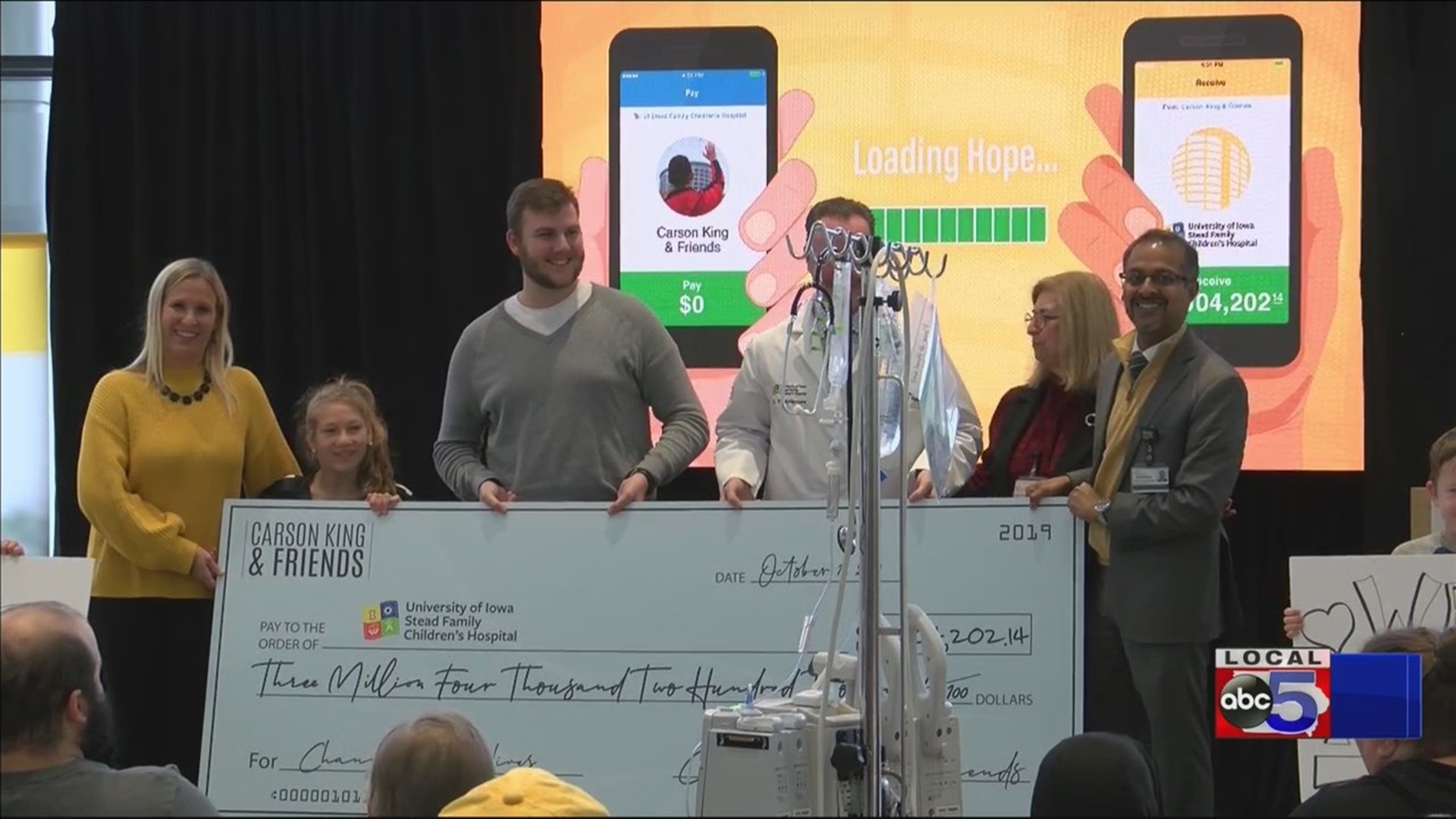 Carson King presents $3M check to UI Stead Family Children's Hospital