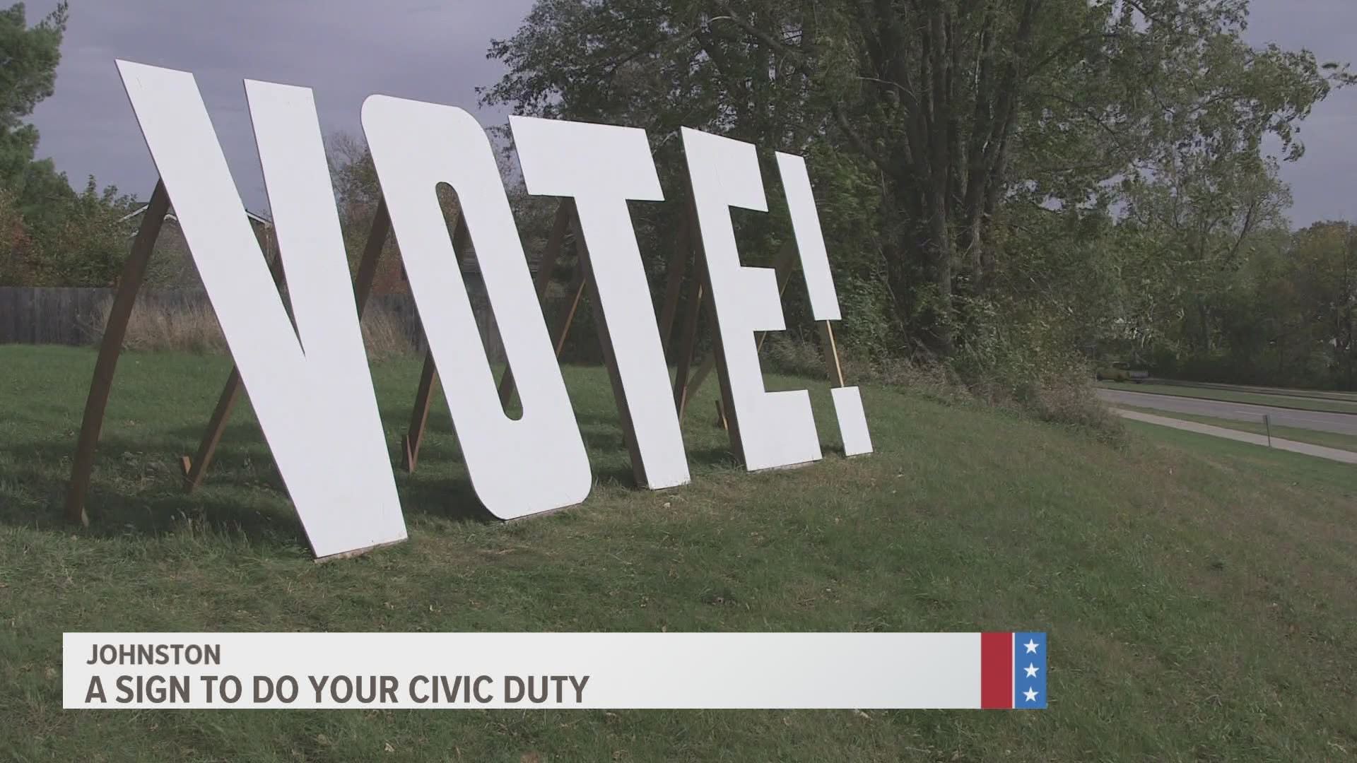 The sign's builder says the sign is up to encourage everyone to vote regardless of party; as a result, no political signs are allowed next to it.
