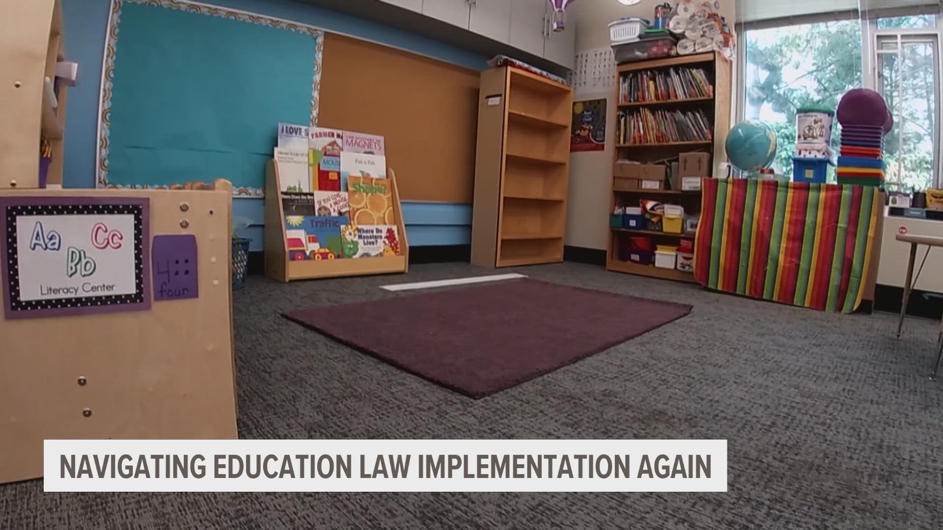 Iowa State Education Association claims there is still little guidance from the state on how to implement the law that removes certain books from school libraries.