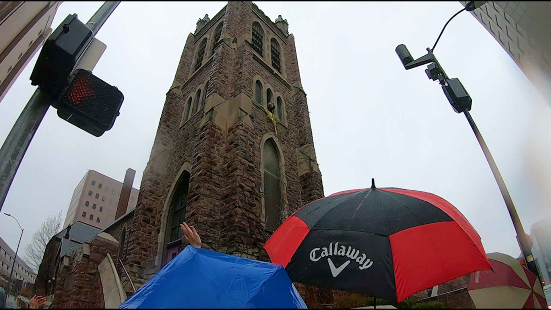 The rain didn't stop people from gathering near St. Paul's Episcopal Cathedral in Downtown Des Moines to hear Easter Sunday hymns.