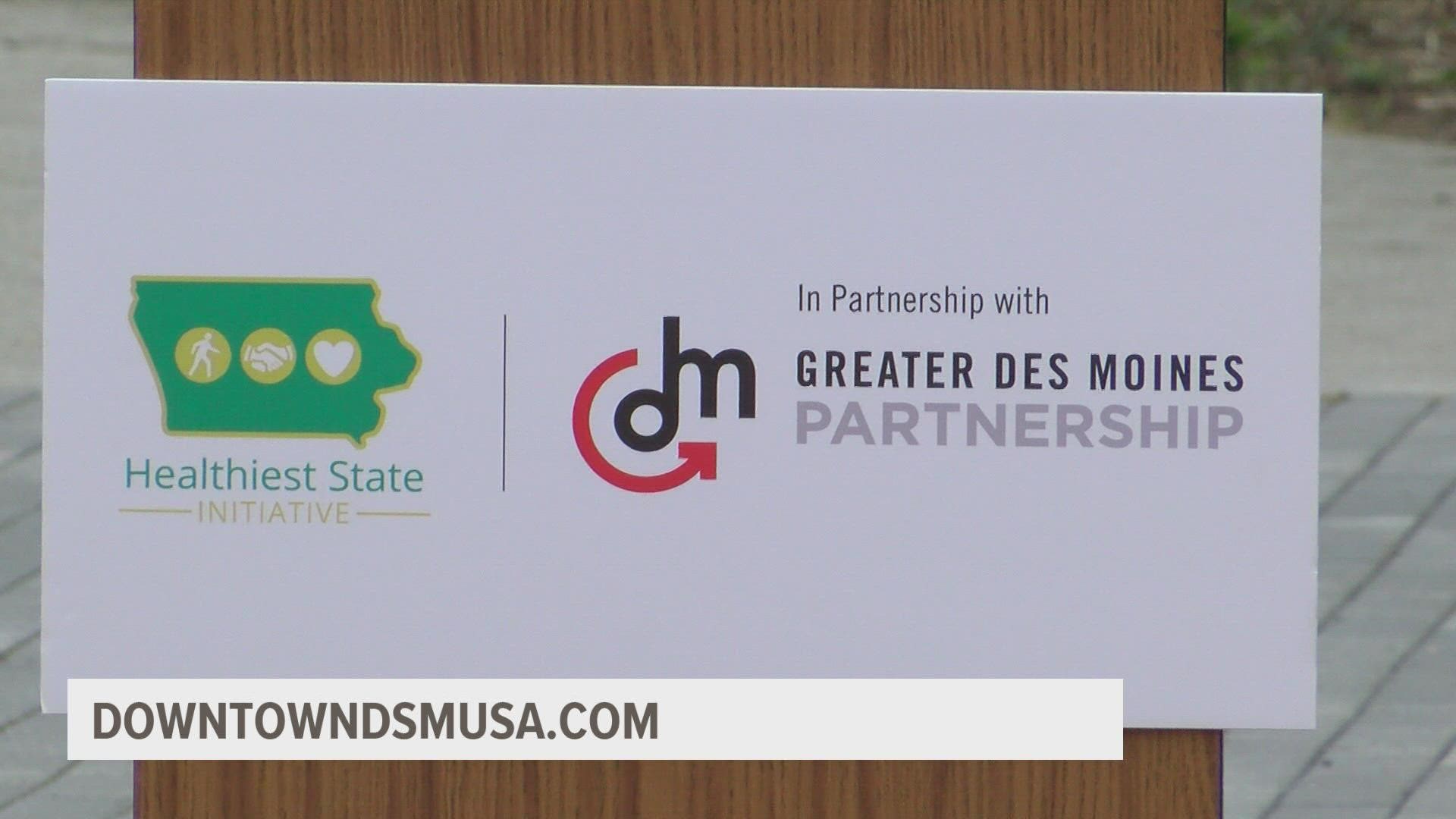 The Greater Des Moines Partnership and the Healthiest State Initiative held a joint event at Cowles Commons to promote walking and staying active.