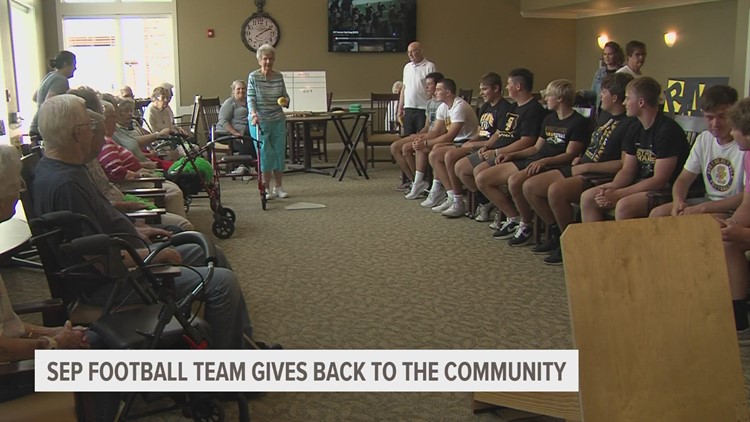 Southeast Polk football team gives back to the community