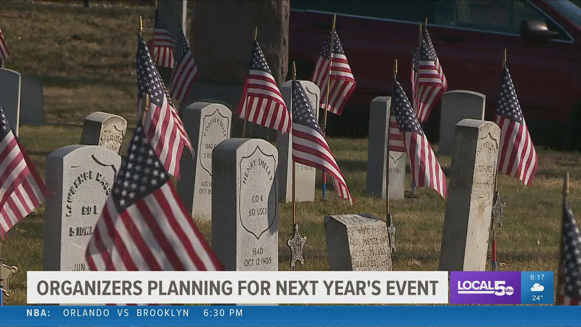 Organizers say they planned to place more than 3,000 wreaths.
