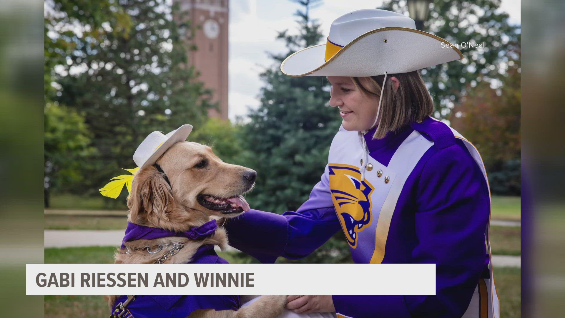 University of Northern Iowa sophomore Gabi Riessen's service dog, Winnie, has become a fan favorite marching with Riessen to make sure she stays safe.