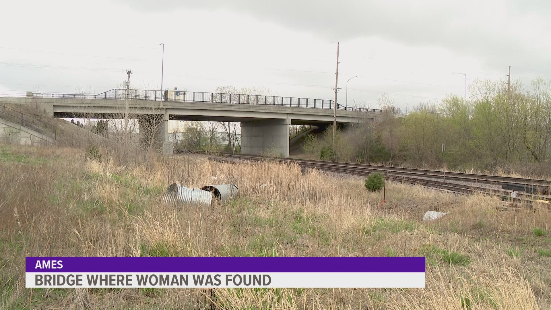 Ames police said Union Pacific Railroad called them early Thursday morning reporting a person was hanging above the tracks.