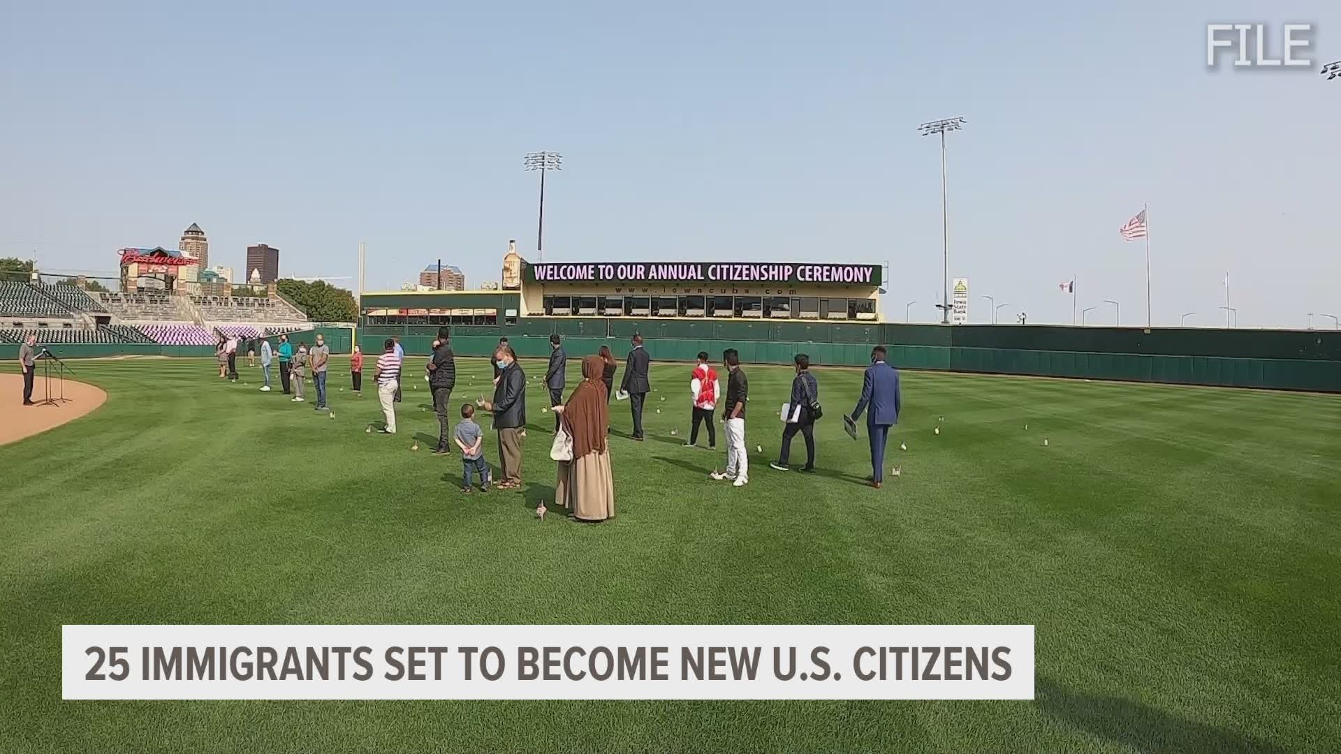 Keeping the Independence Day celebrations alive into Tuesday, 25 people became United States citizens from the Iowa Cubs' home.