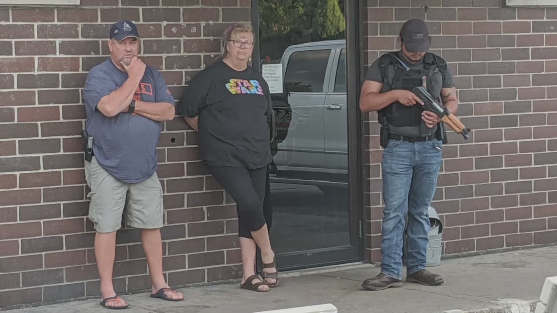 Bar owners explain why they stood armed outside their business amid protests