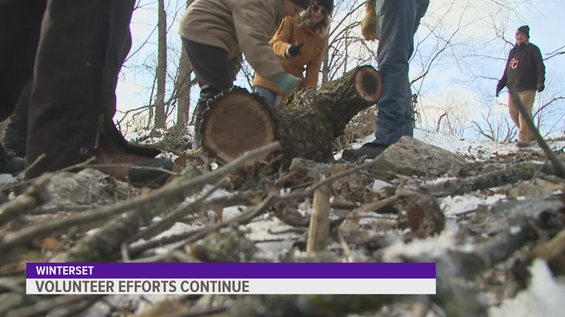 Efforts are still underway as community members step up to help clear away debris and damage.