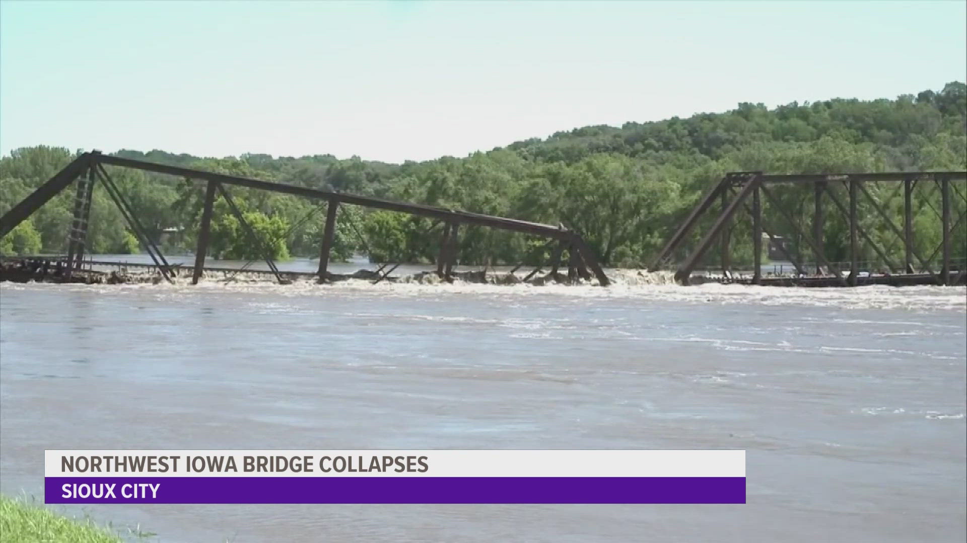A railroad bridge connecting Iowa and South Dakota has collapsed amid flooding that has also forced water rescues, led to evacuations and caused at least one death.