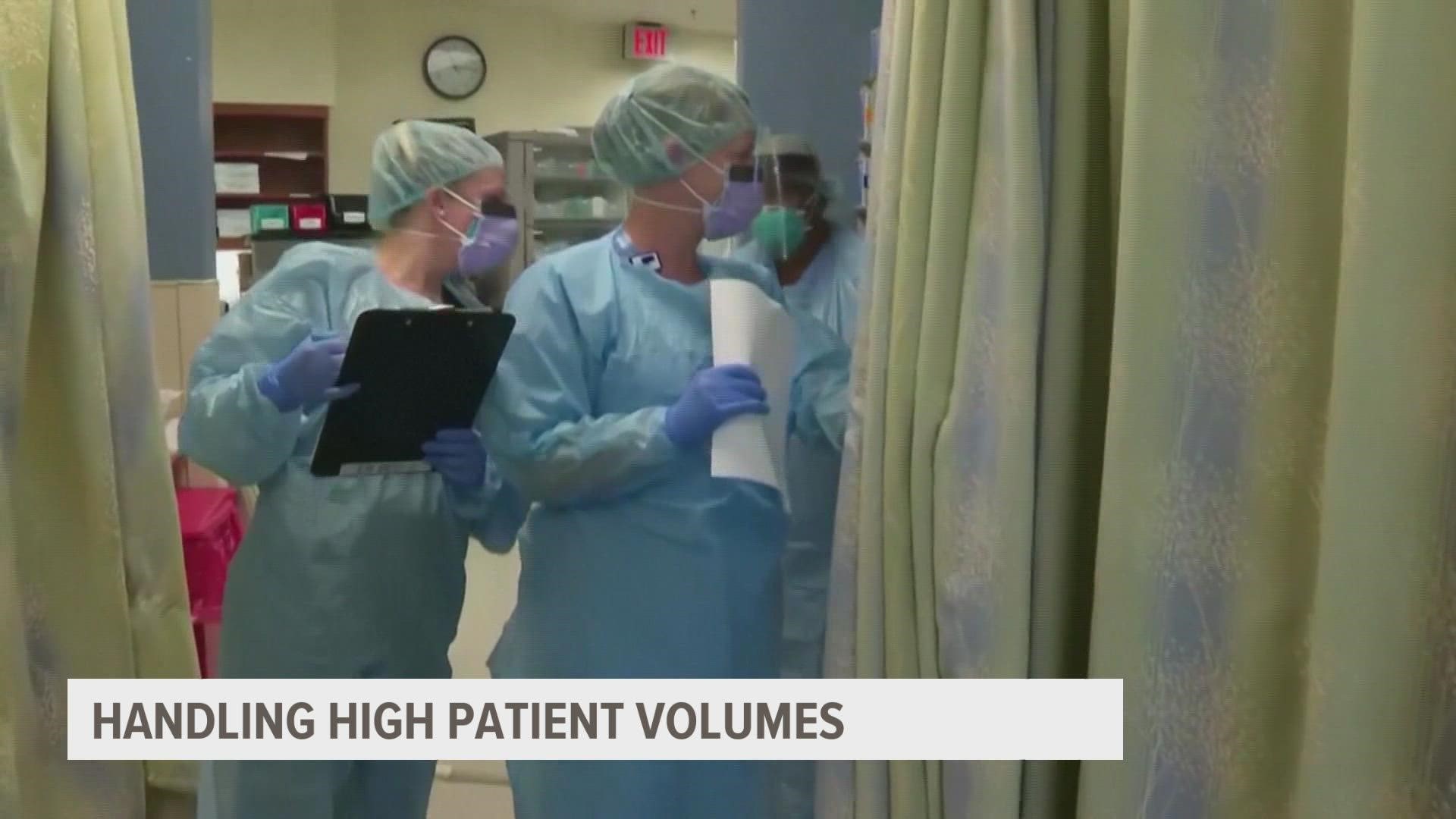 A doctor at a metro hospital said it's tough dealing with high patient volumes, but protocols at her facility are making the situation more manageable.