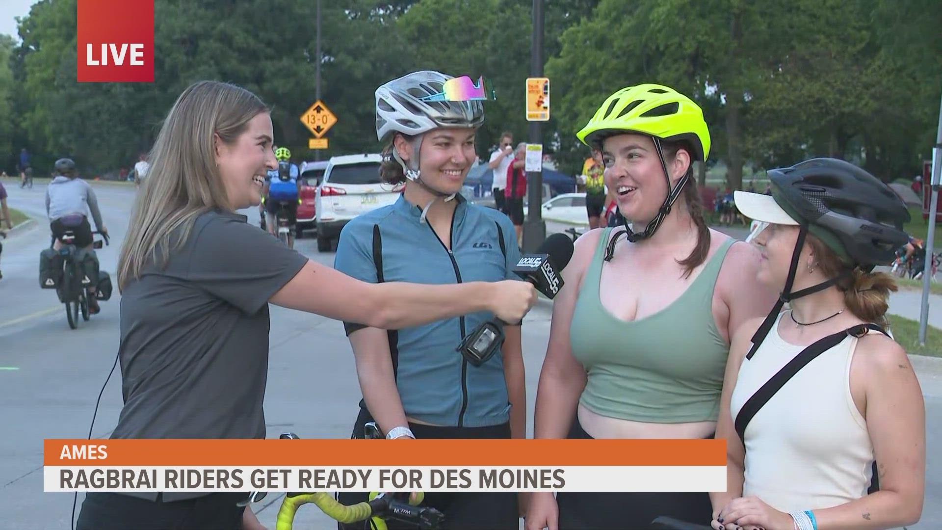 Local 5's Meghan Macpherson talks to cyclists before they begin their ride to Des Moines.