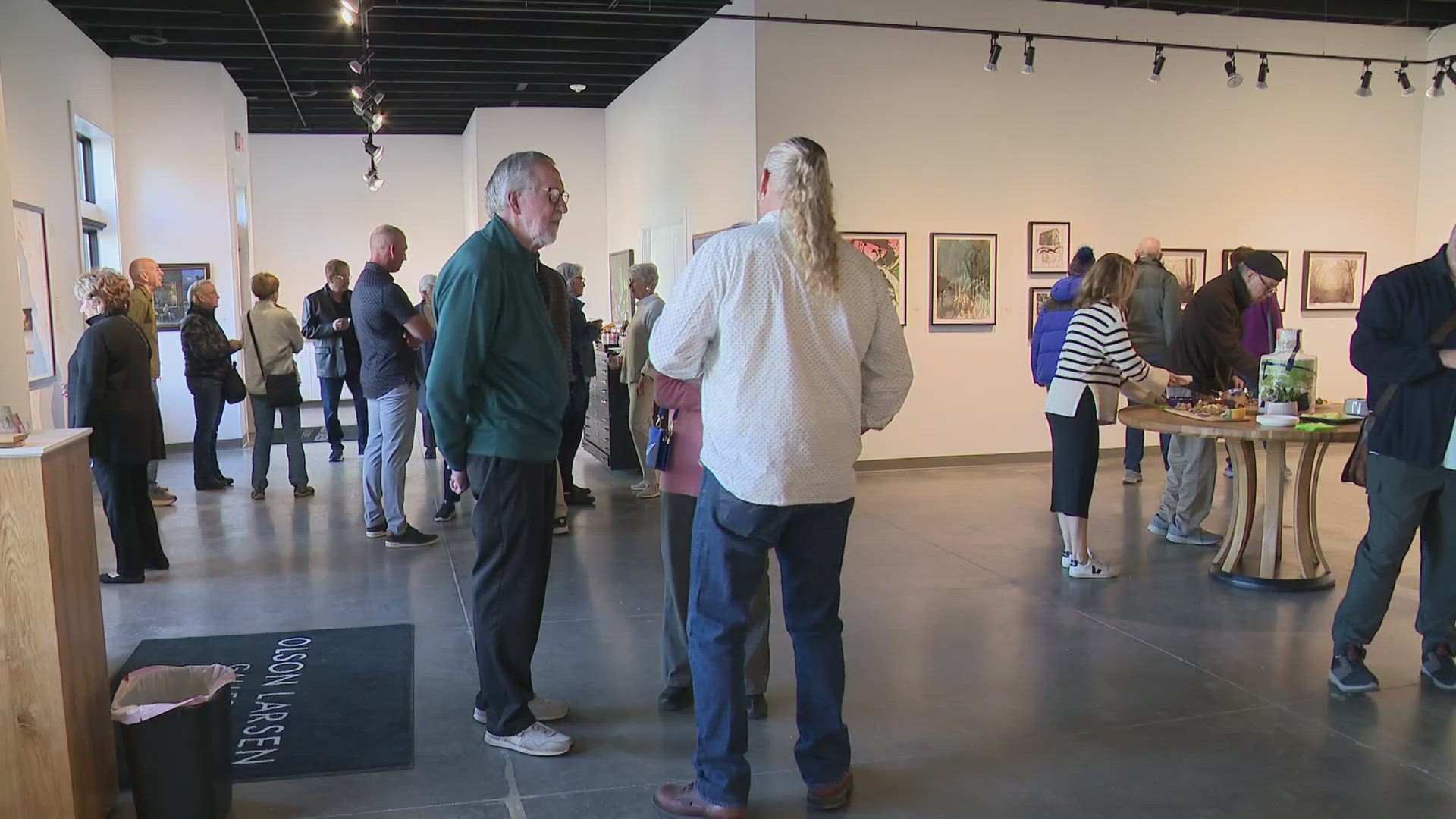 Olson-Larsen Galleries hosted an opening reception to their spring show "Another Side of the Story"
