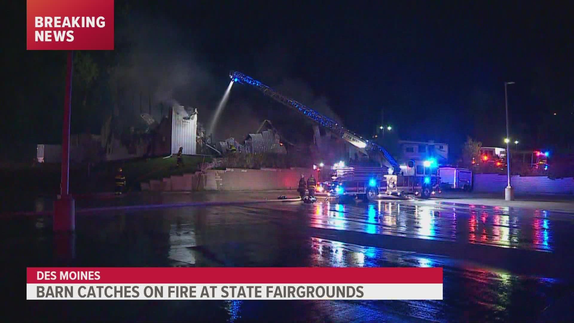 Firefighters responded to a metal barn on fire at the Iowa State Fairgrounds in Des Moines early Wednesday.