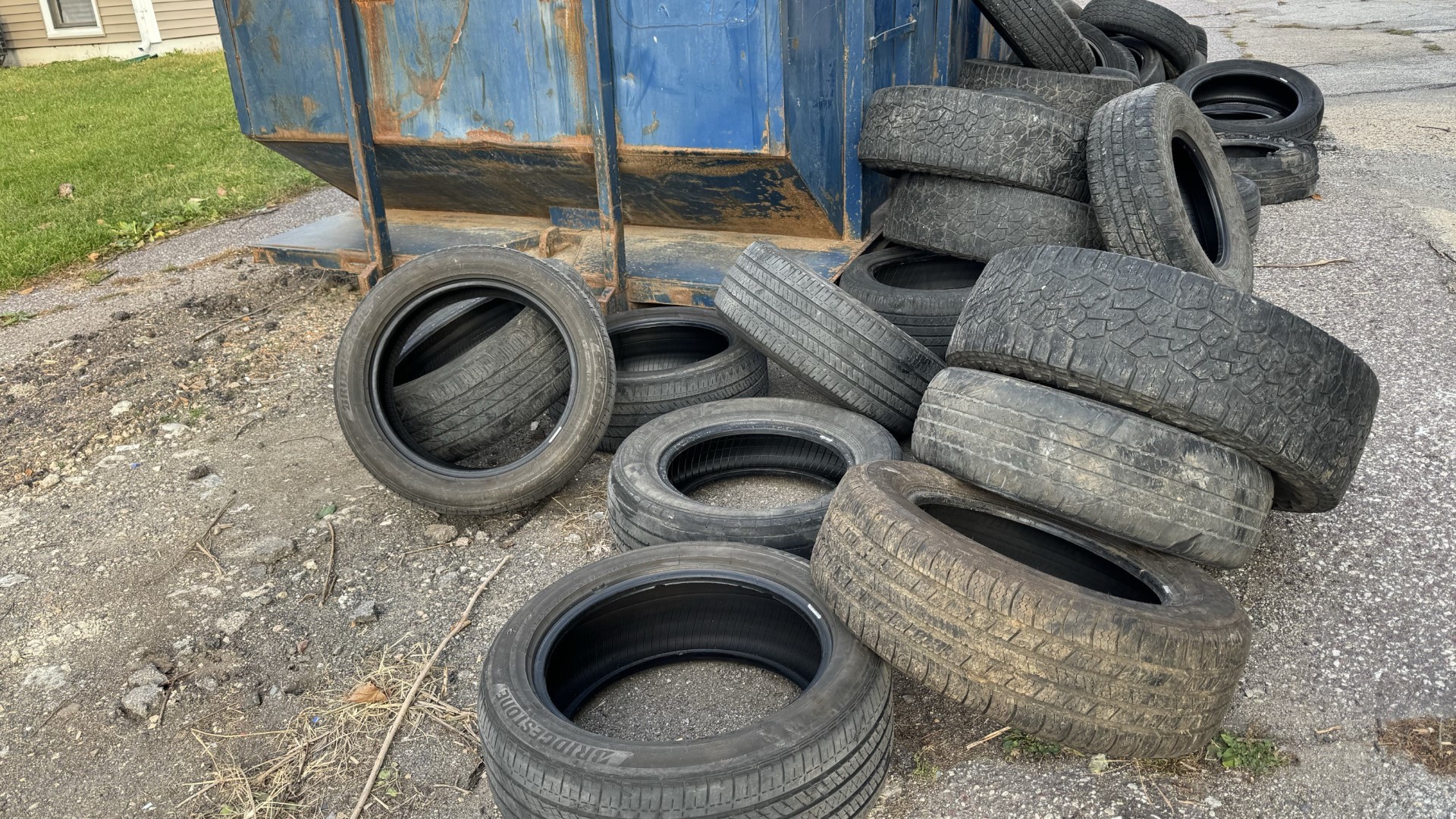 The property manager says they've been burning through cash quickly over the last several months all because someone keeps dumping piles of tires on their property.