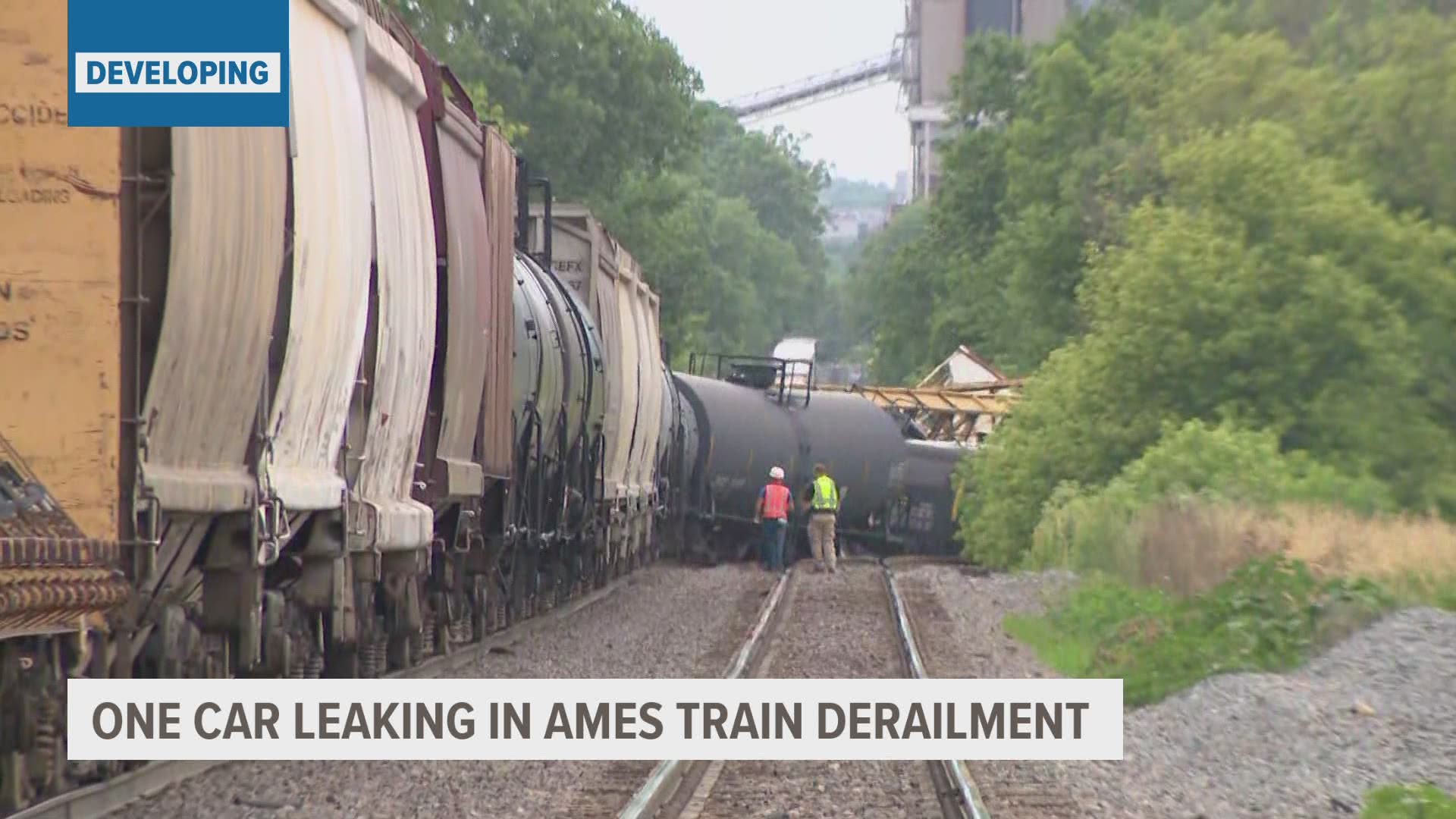 The Ames Fire Department says about 27 cars jumped the track. They are evacuating 15-20 commercial properties in the area as a precaution.