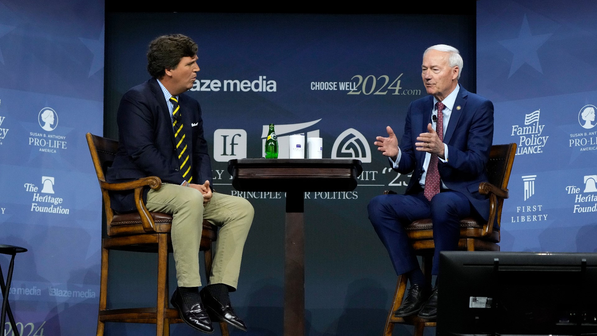 Gov. Kim Reynolds signed a new abortion ban into law in front of 2,000 conservative Christians at the Family Leadership Summit in Des Moines.