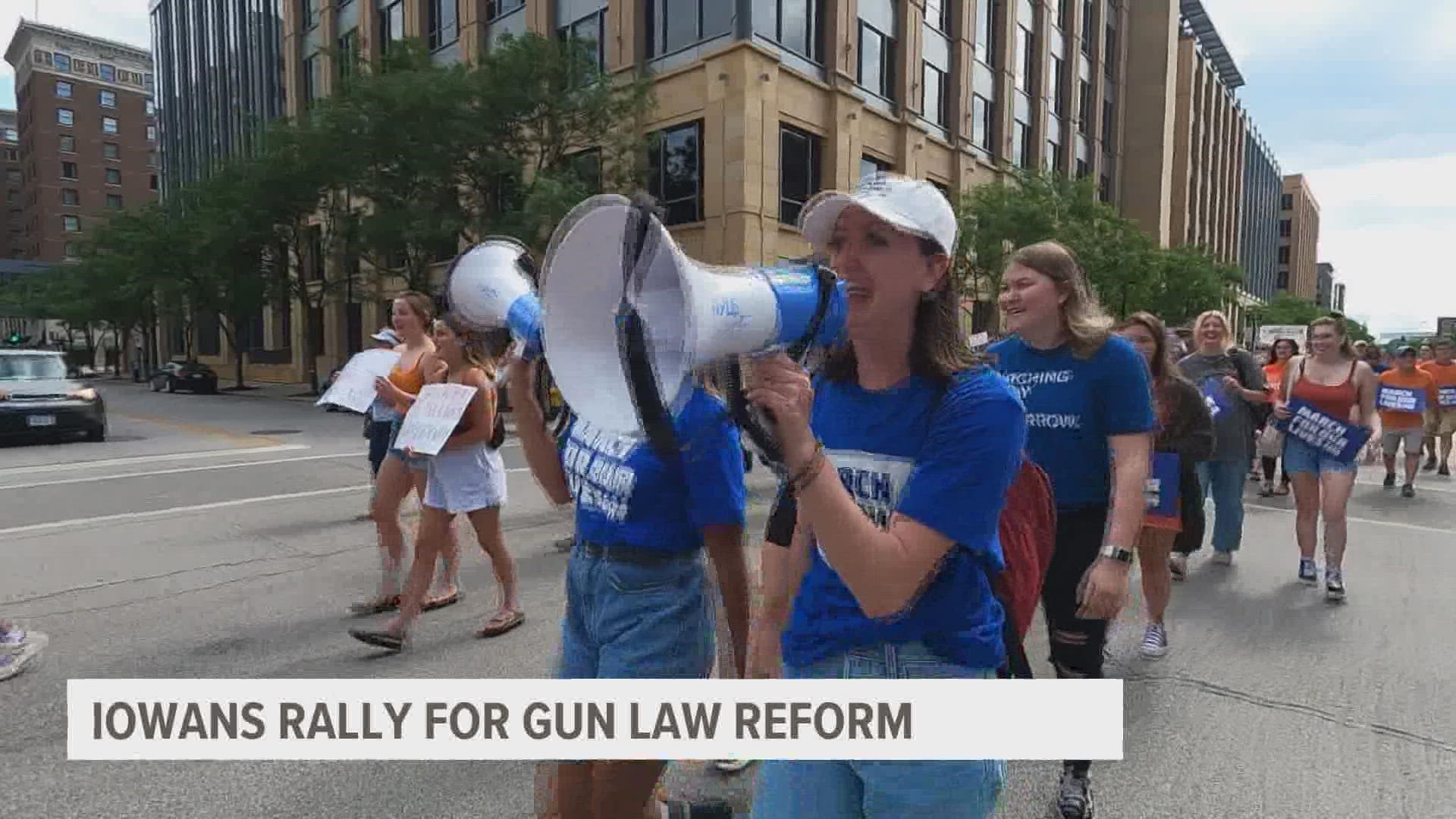 Nearly 150 people marched in downtown Des Moines calling for action from the Iowa legislature, but their demands face opposition.