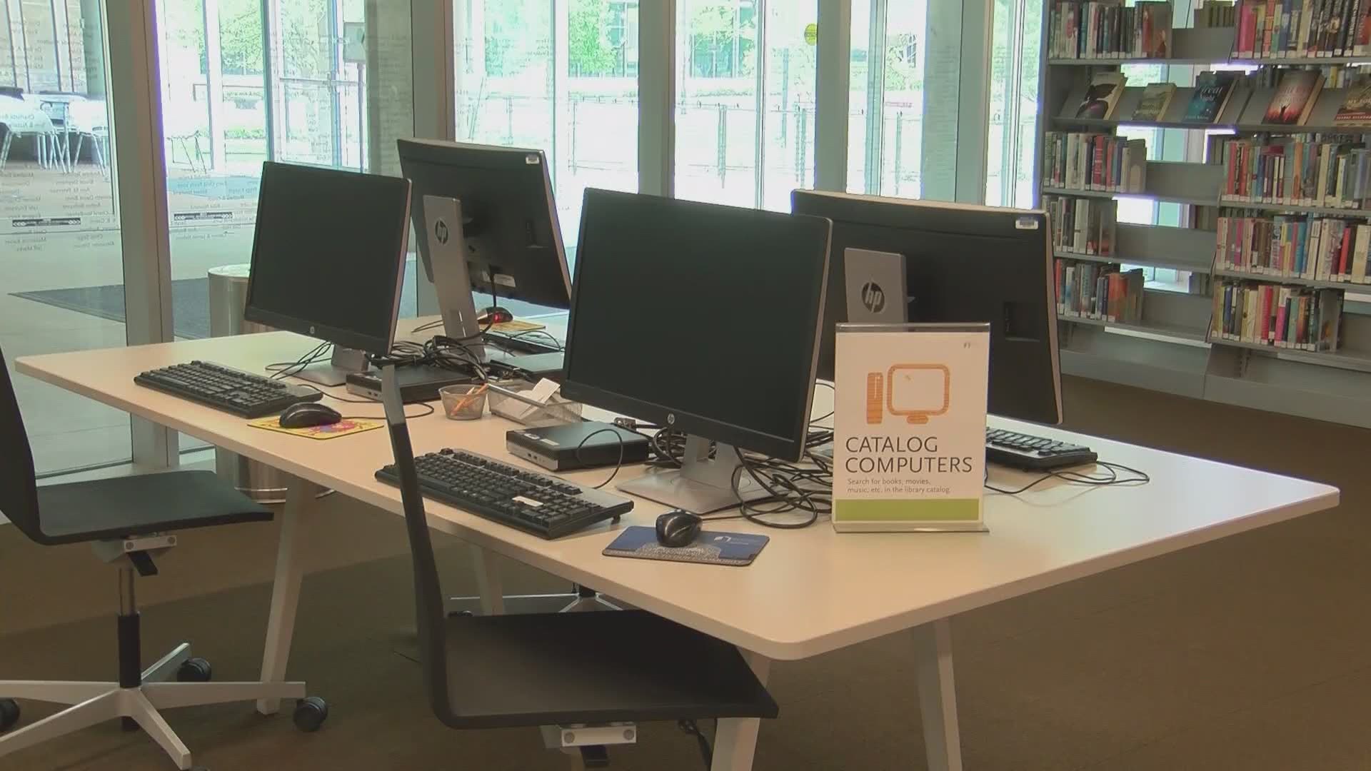 Staff at the Central Library in Des Moines are in their first phase of reopening this week by working the drive-thru.