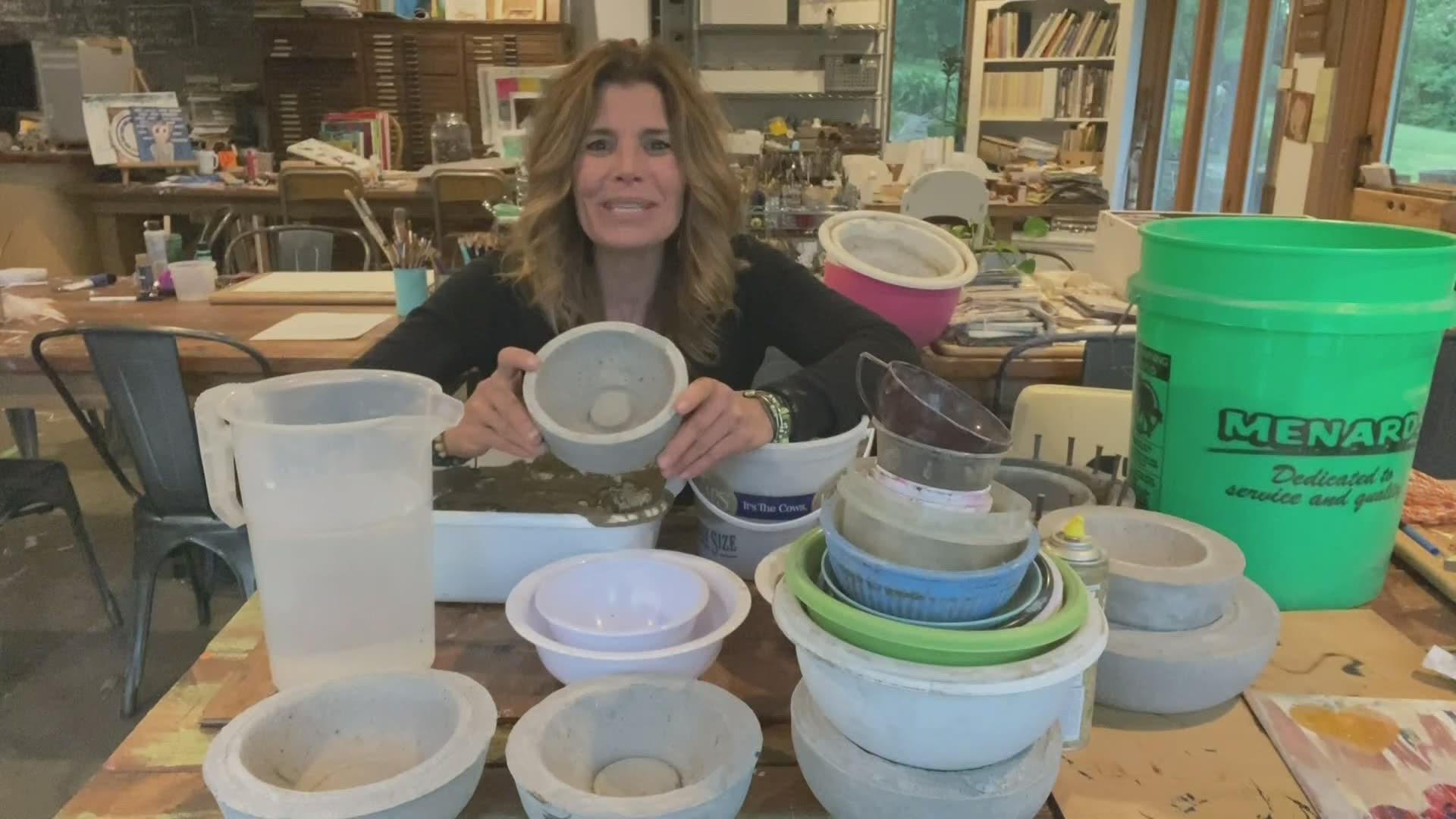 Michele creates bowls out of concrete this morning on Iowa Live