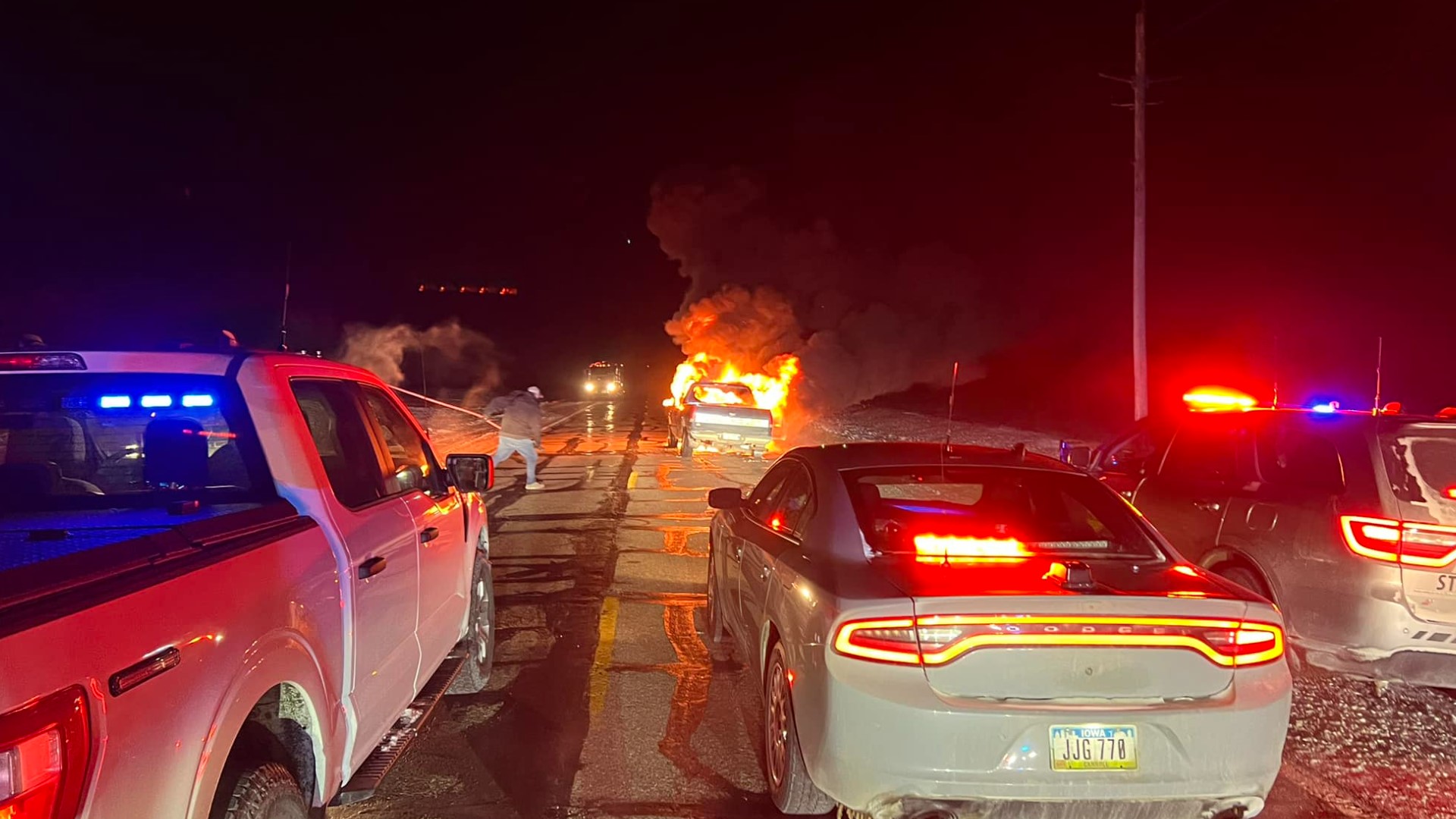 An Iowa driver is in custody after hitting two patrol cars, leaving the scene and "revving" their engine until a vehicle fire began.